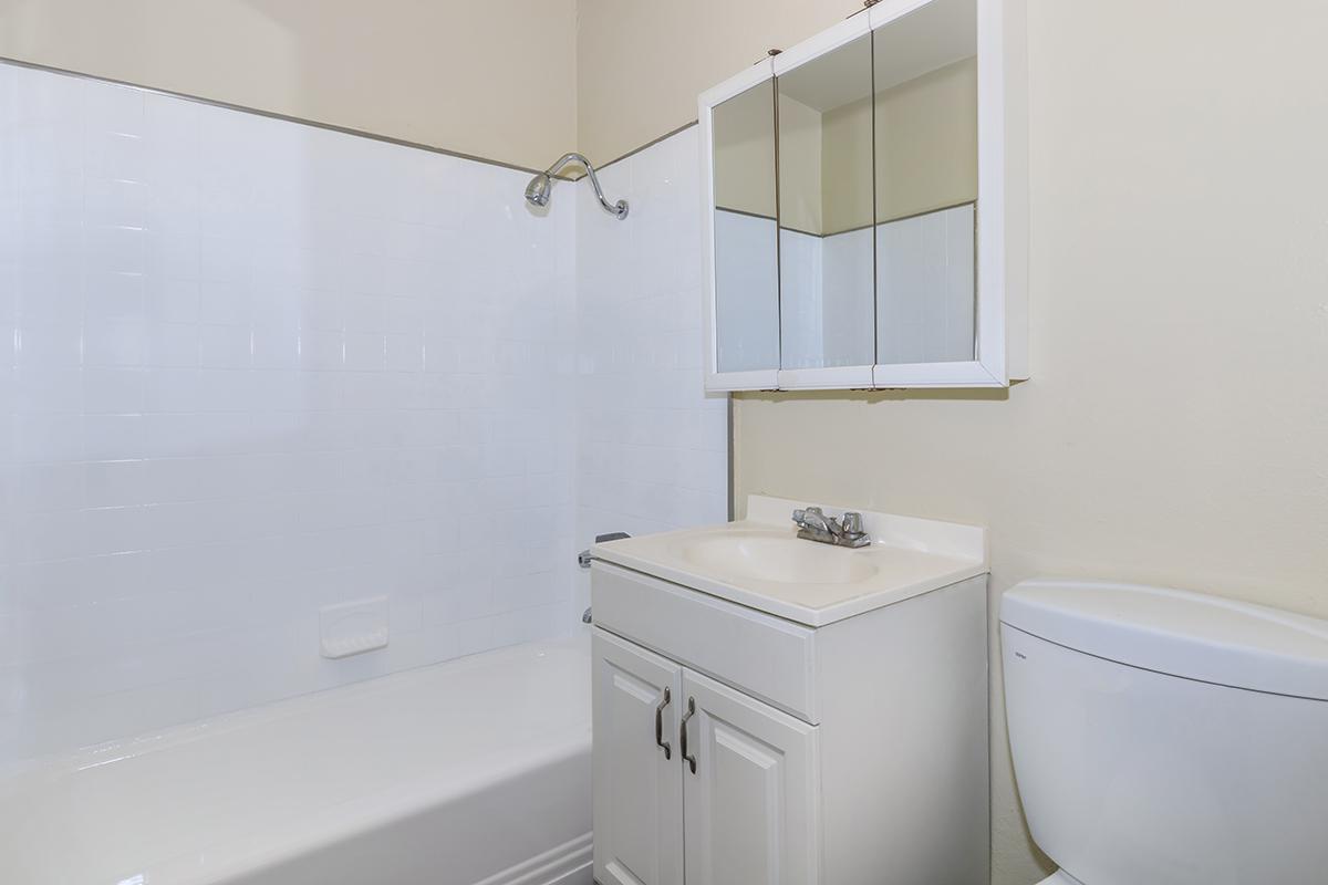 Bathroom with white cabinets