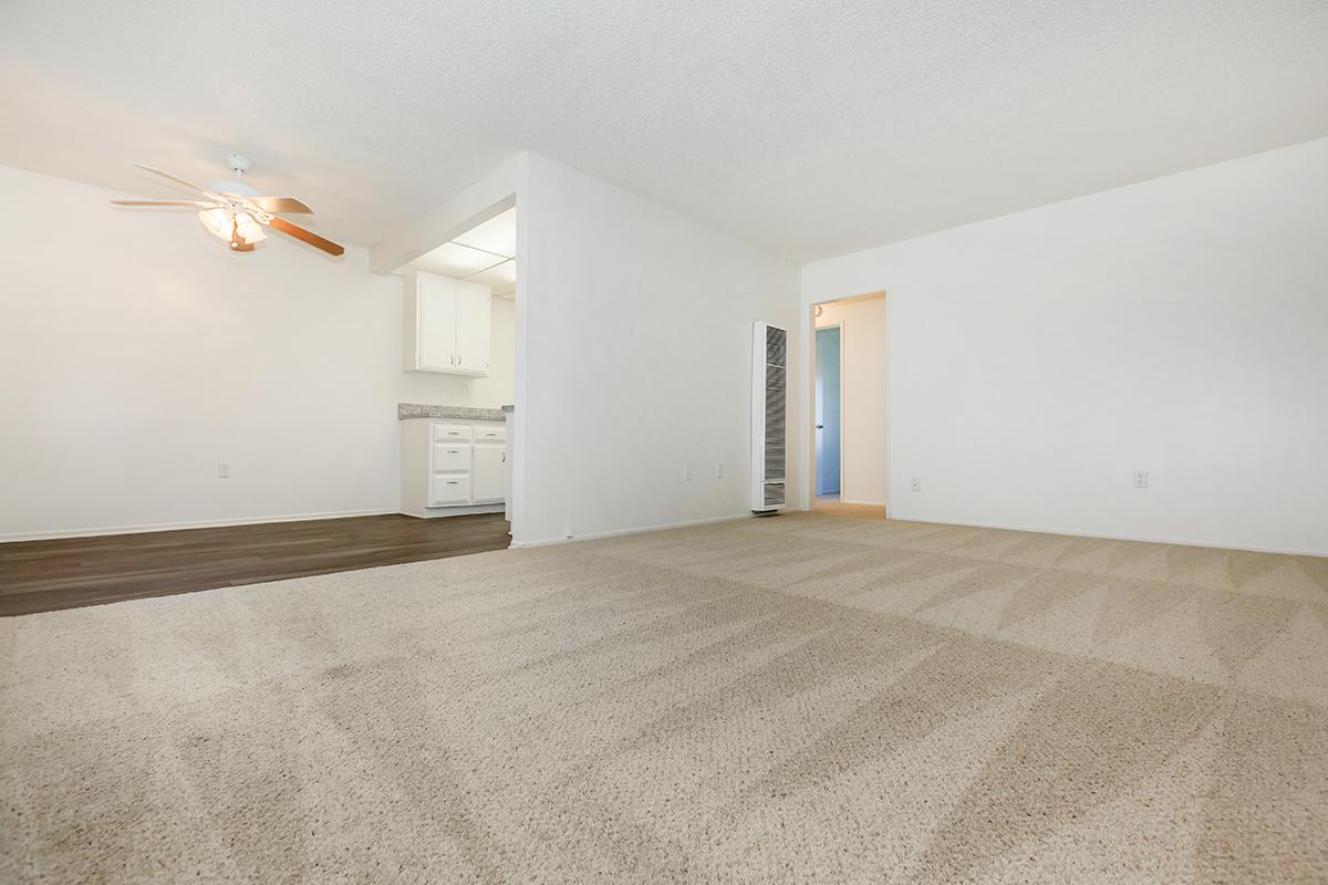 a bedroom with a bed in a room