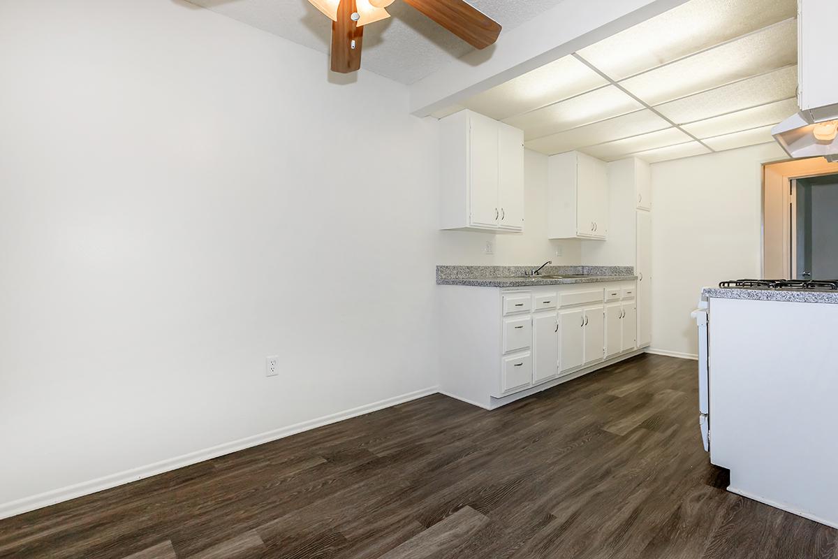 a white refrigerator freezer sitting inside of a building