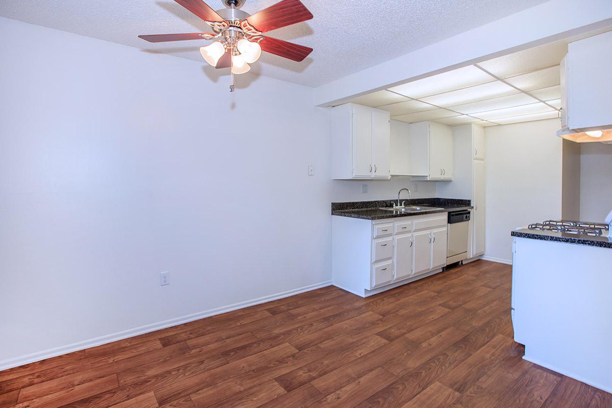 a kitchen with a wood floor