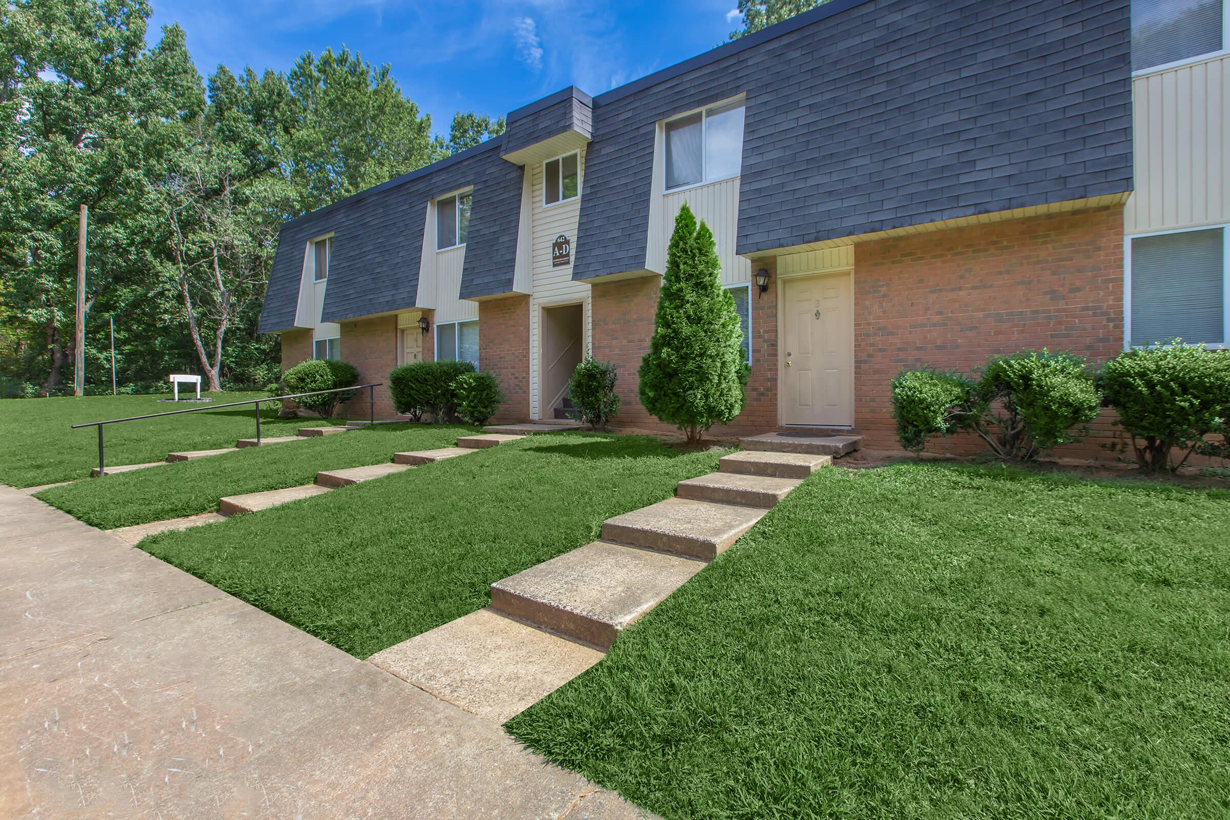 a large lawn in front of a house