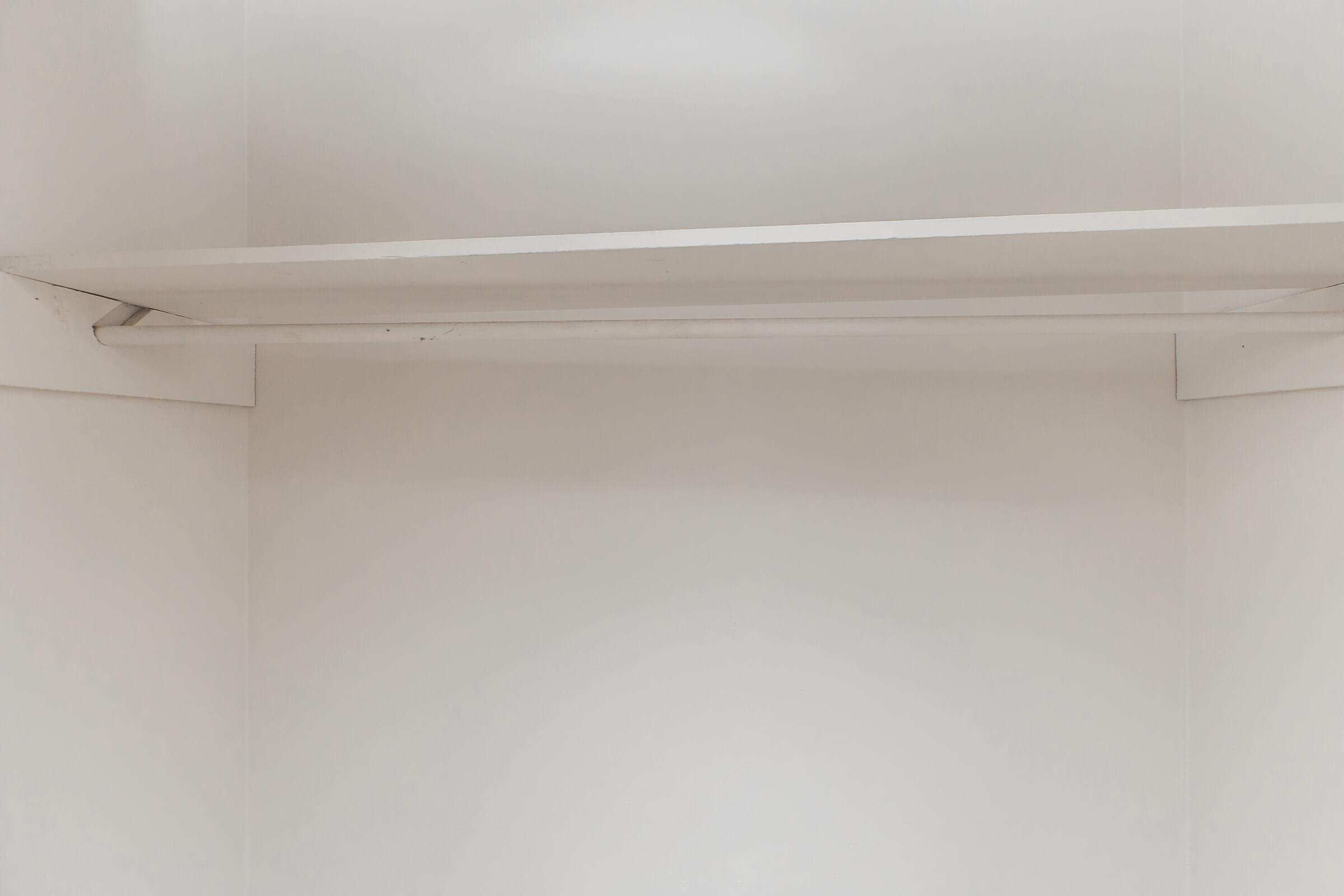 a white refrigerator freezer sitting in a room