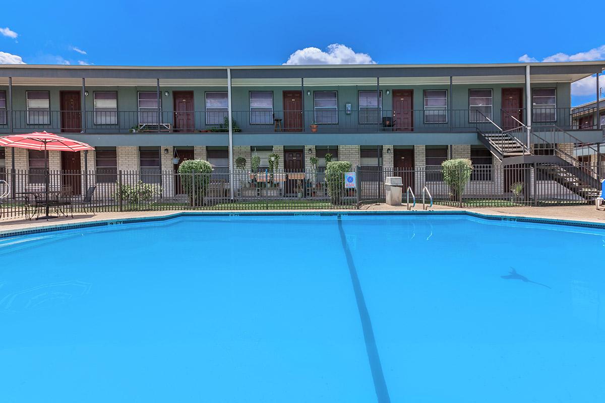 a large pool of water in front of a building