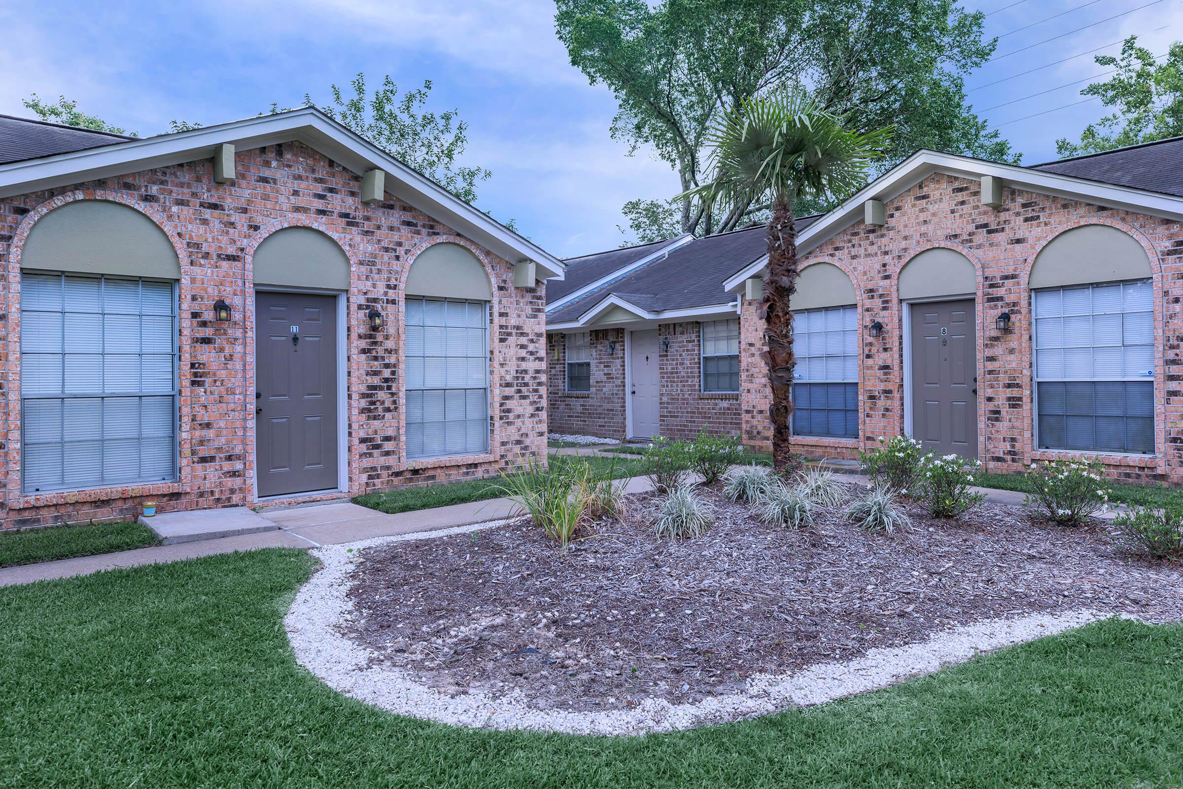 a large lawn in front of a house