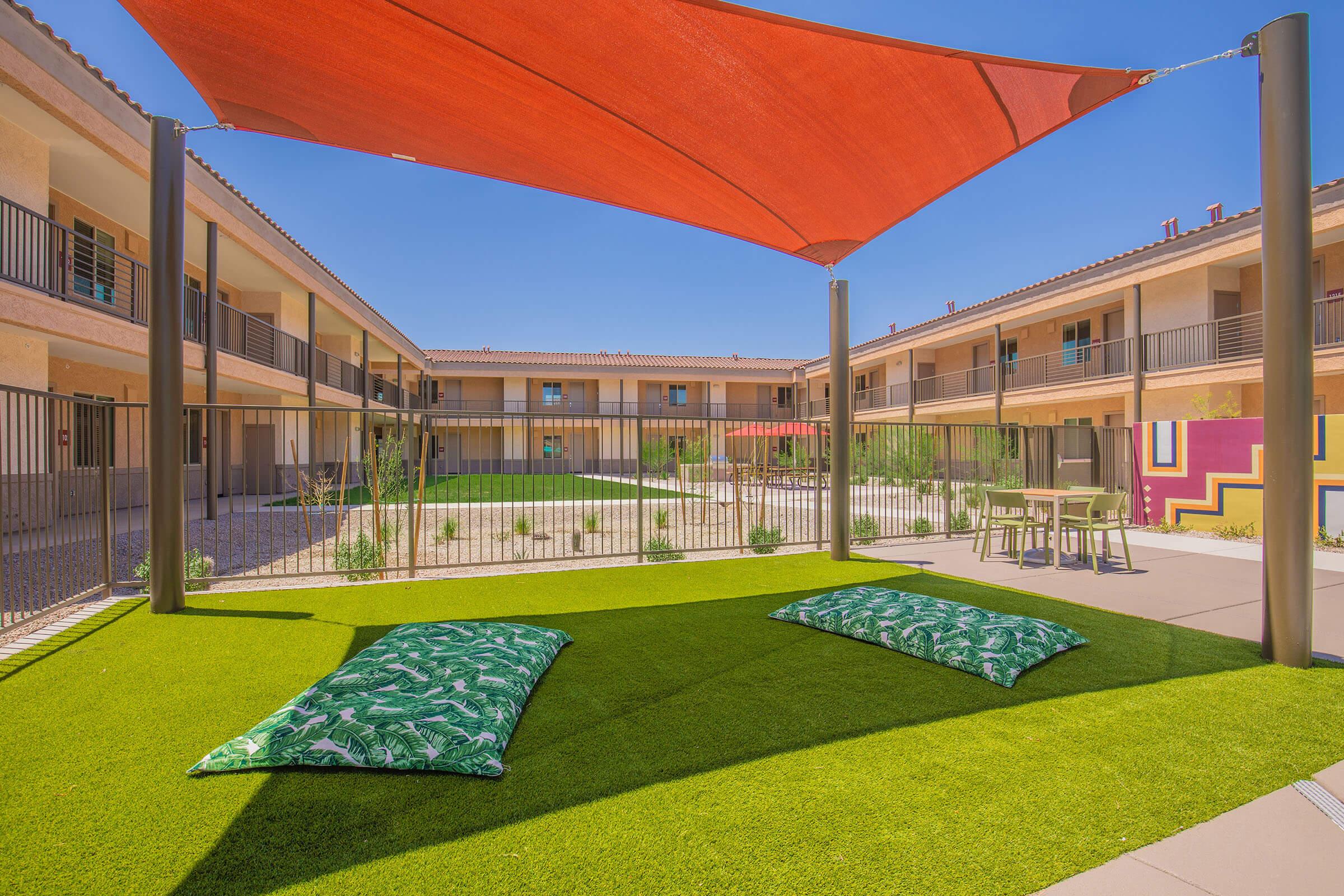 a large lawn in front of a building