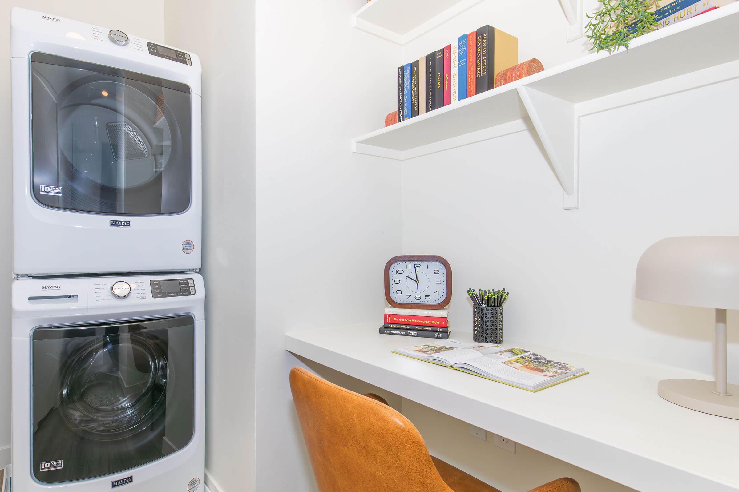 a microwave oven sitting on top of a refrigerator