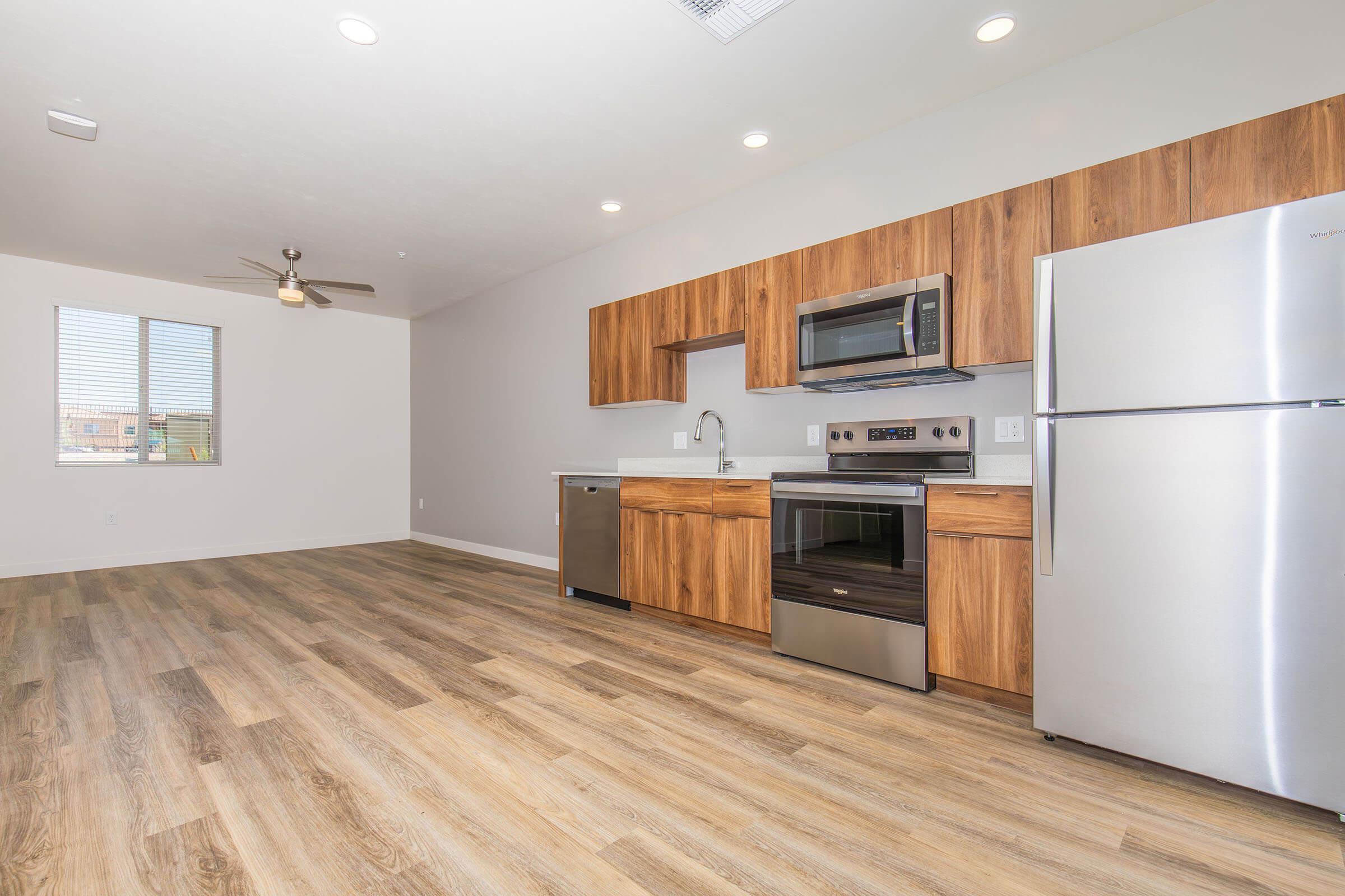 a kitchen with a wood floor