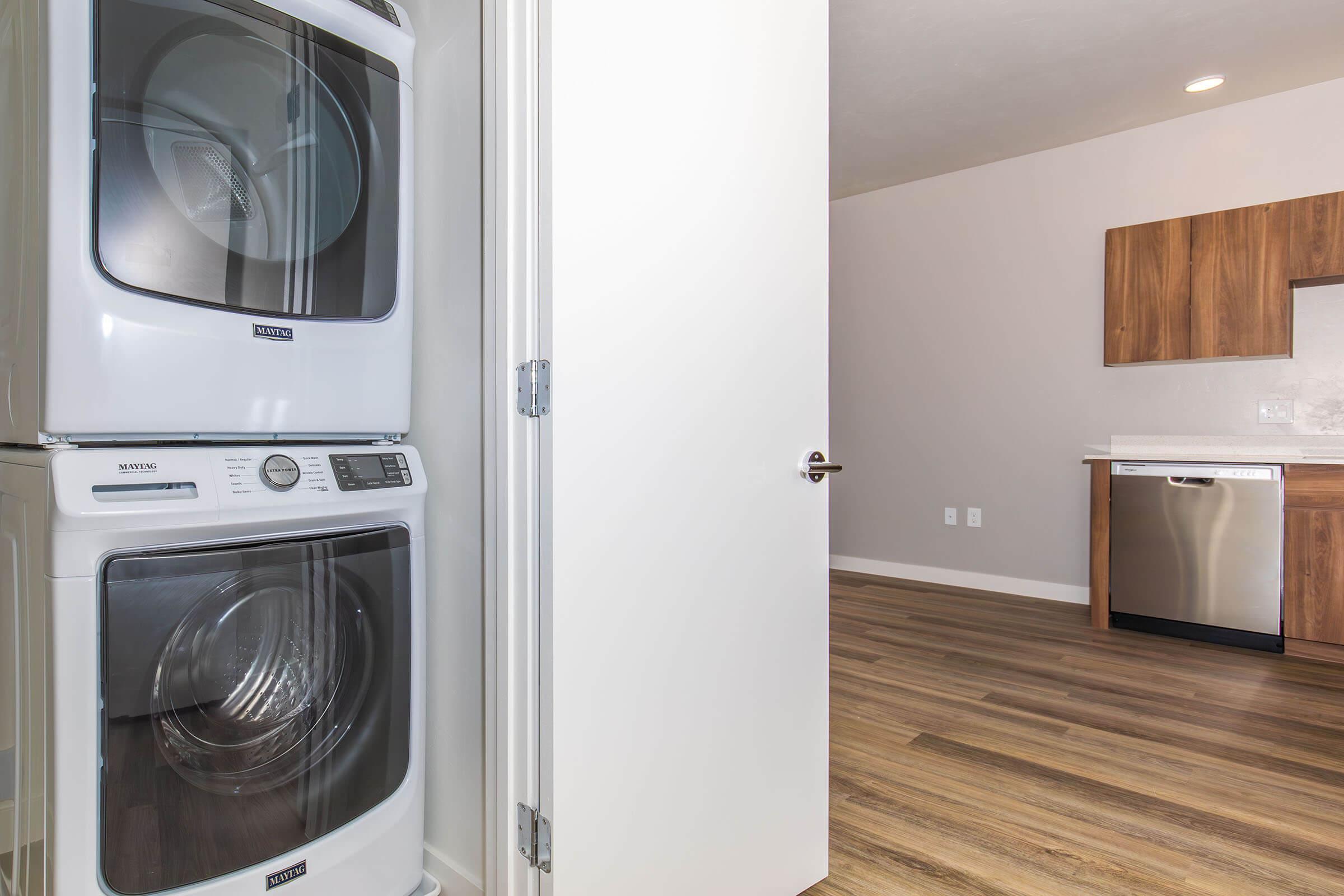 a stove top oven sitting inside of a kitchen