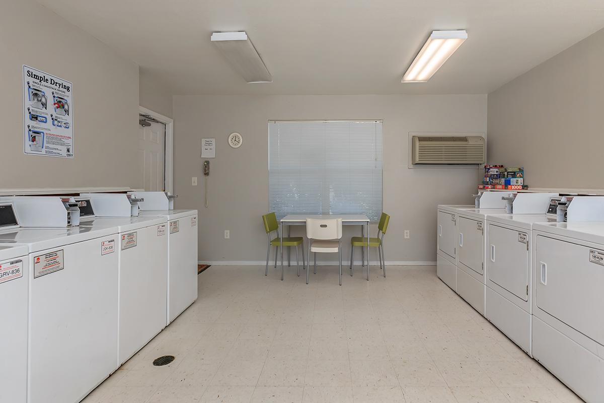 a white refrigerator freezer sitting inside of a kitchen