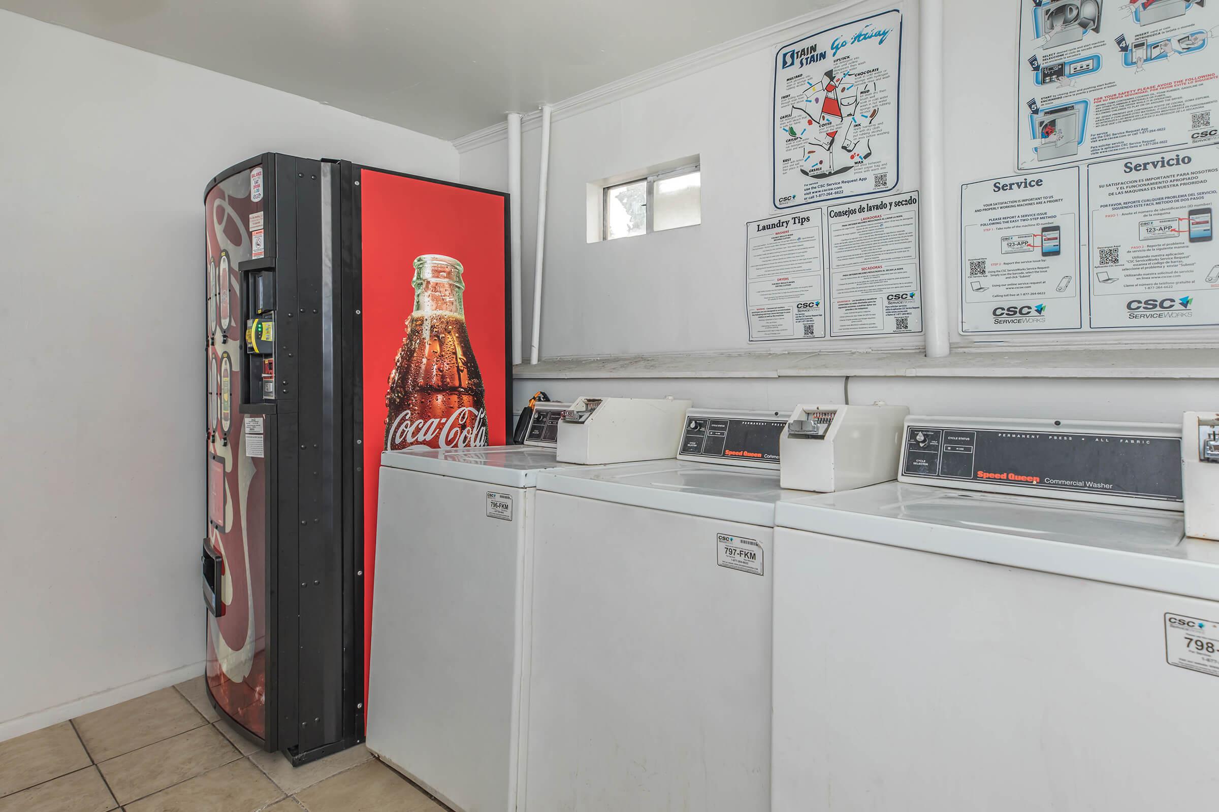 a white refrigerator freezer sitting inside of a kitchen
