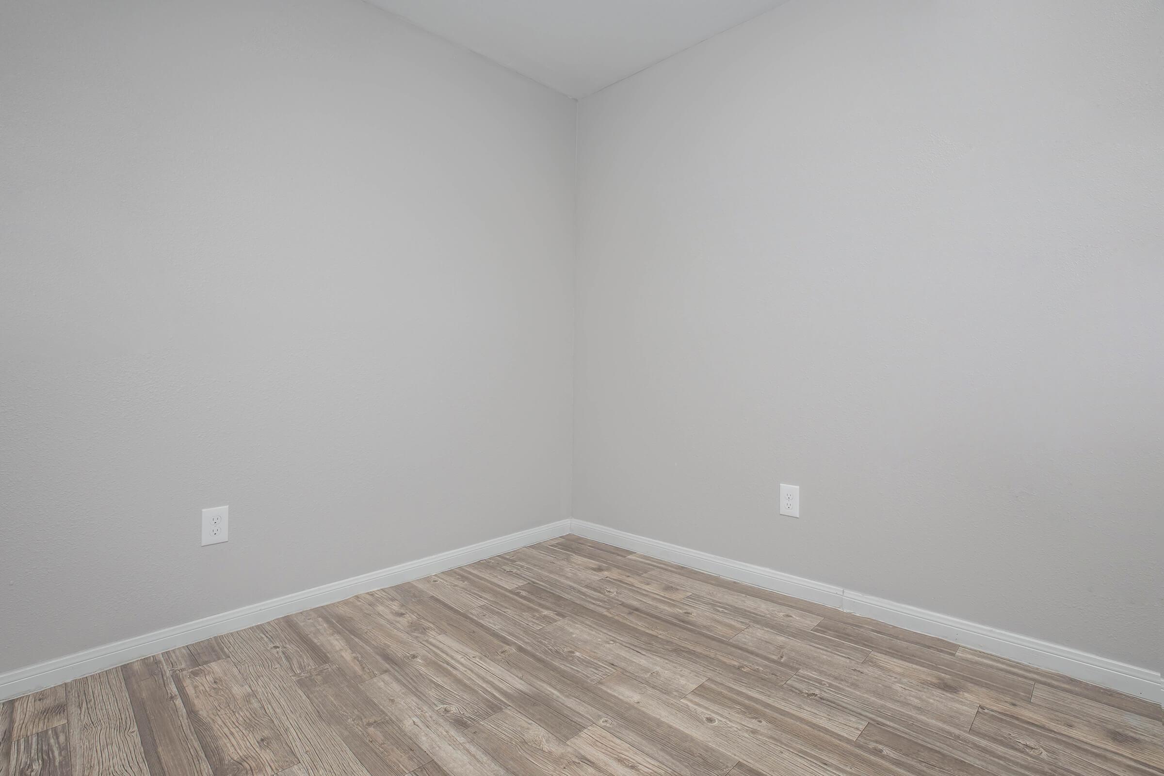 a close up of a white wall