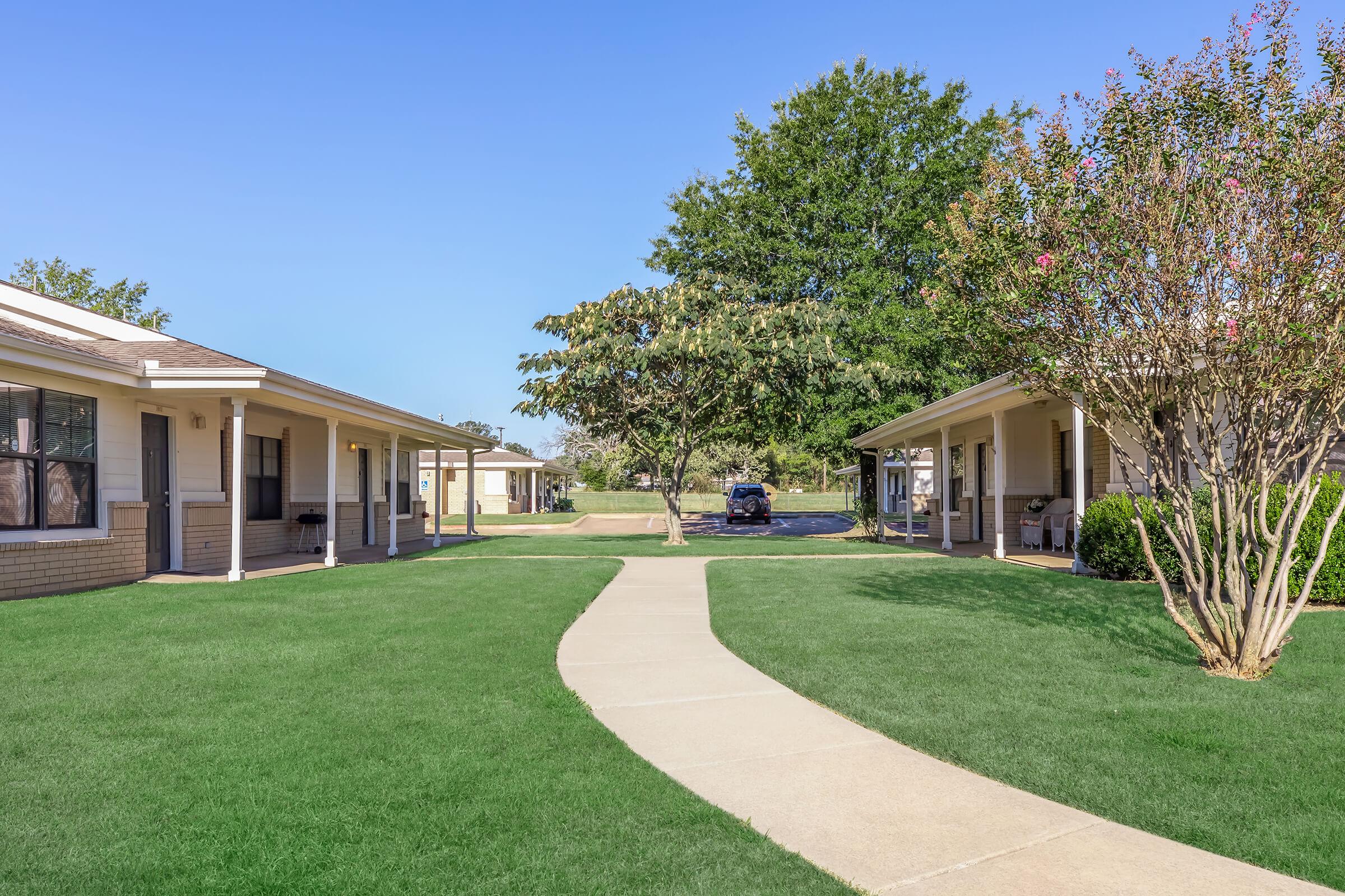 a large lawn in front of a house