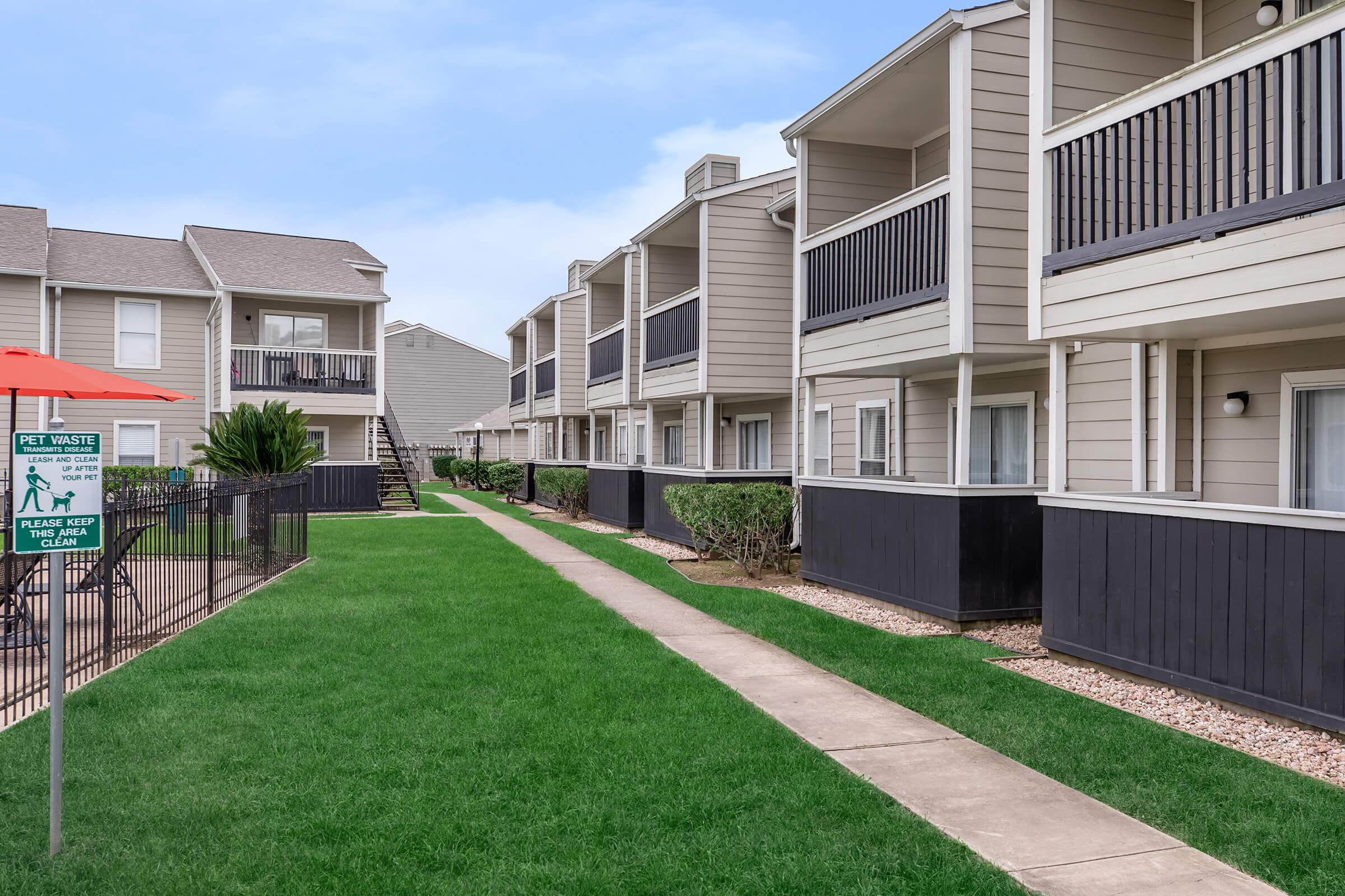 a large lawn in front of a house