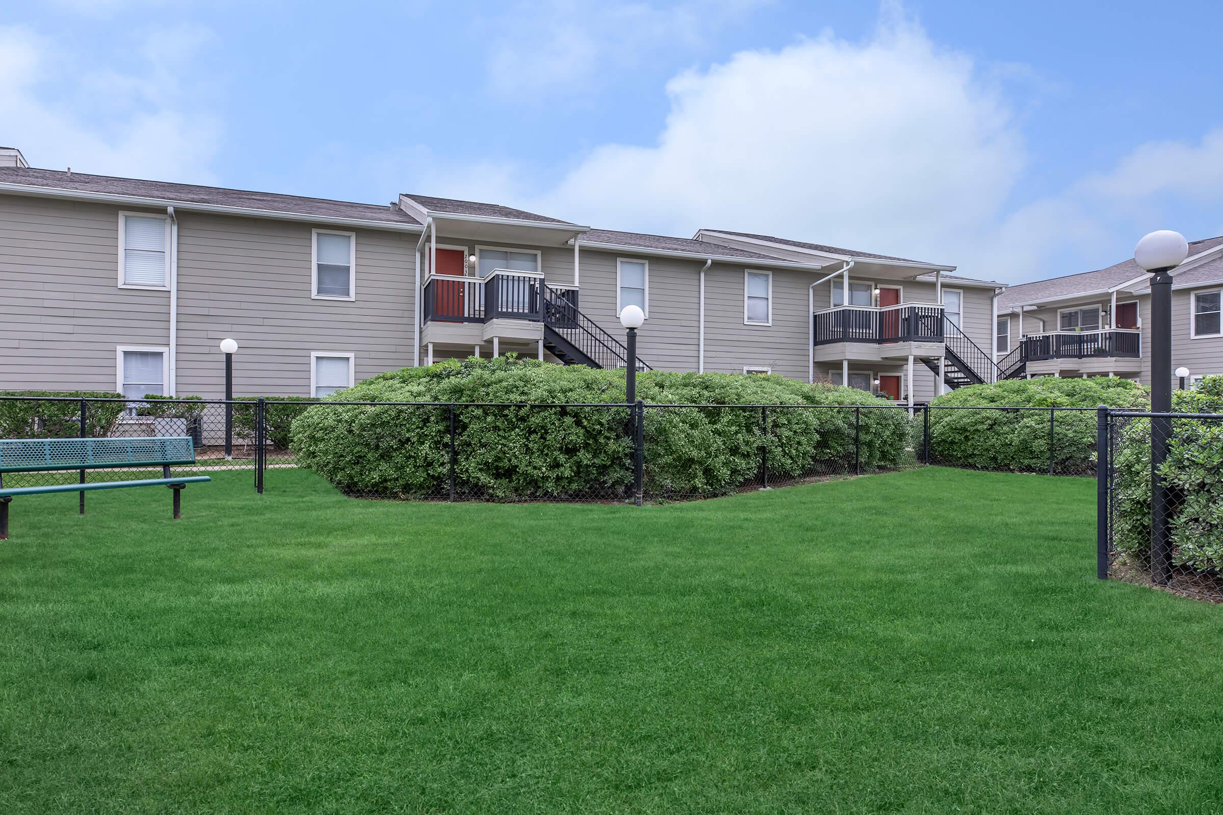 a large lawn in front of a house