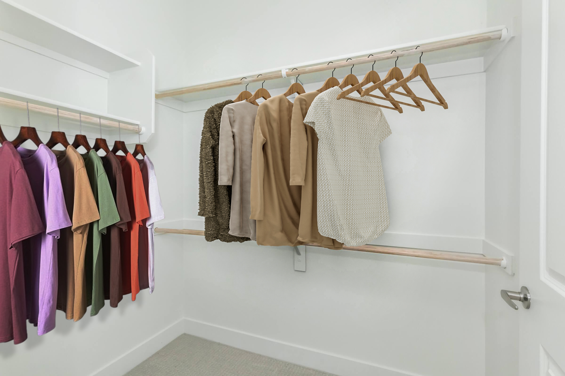 A neatly organized closet featuring a variety of clothing items. On the left, several short-sleeved shirts in various colors hang on wooden hangers. On the right, several lighter-colored garments, including a textured piece and a knit top, are neatly arranged. The walls are white, and the floor is carpeted.