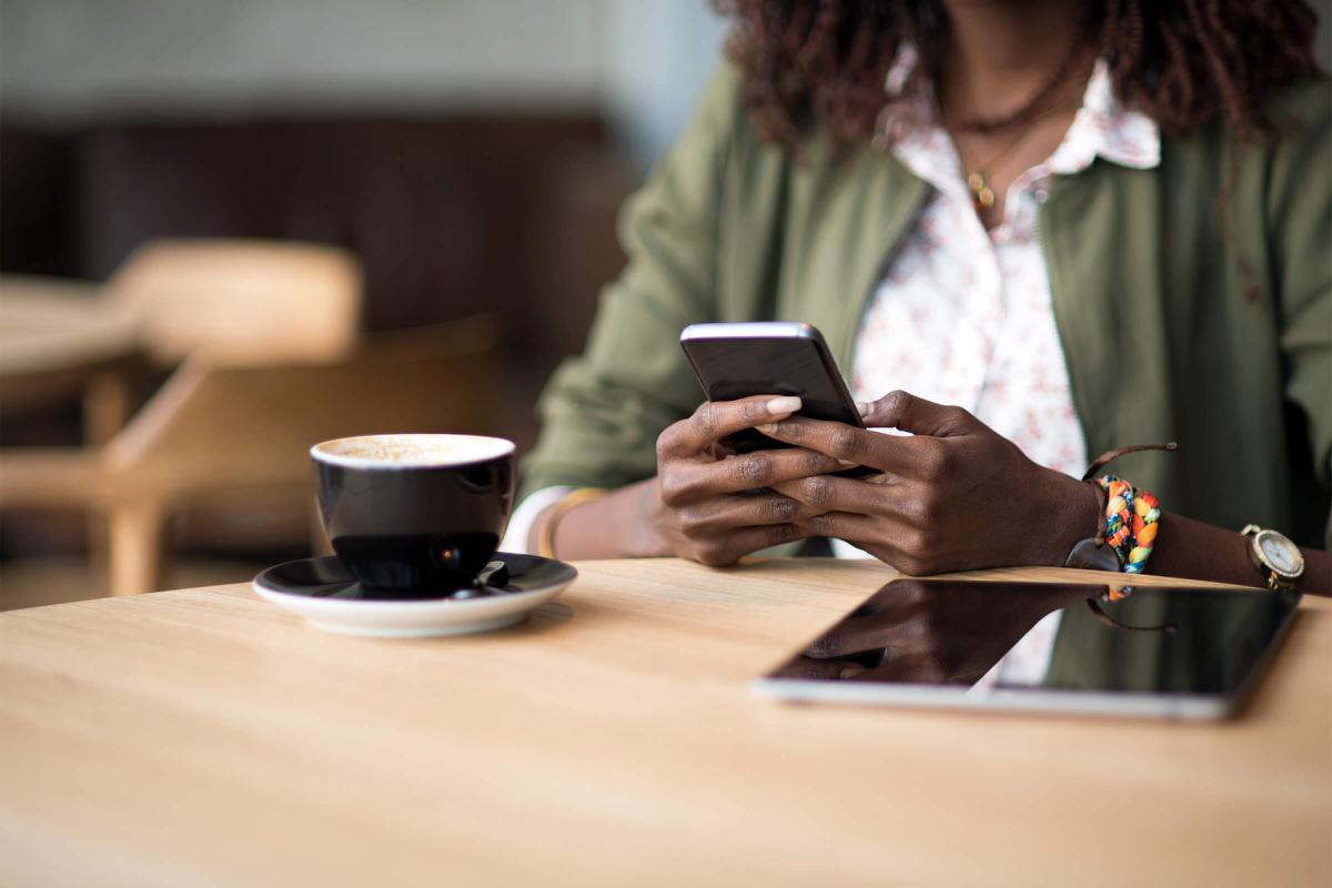 Close up of a woman using mobile phone iStock-673723042.jpg