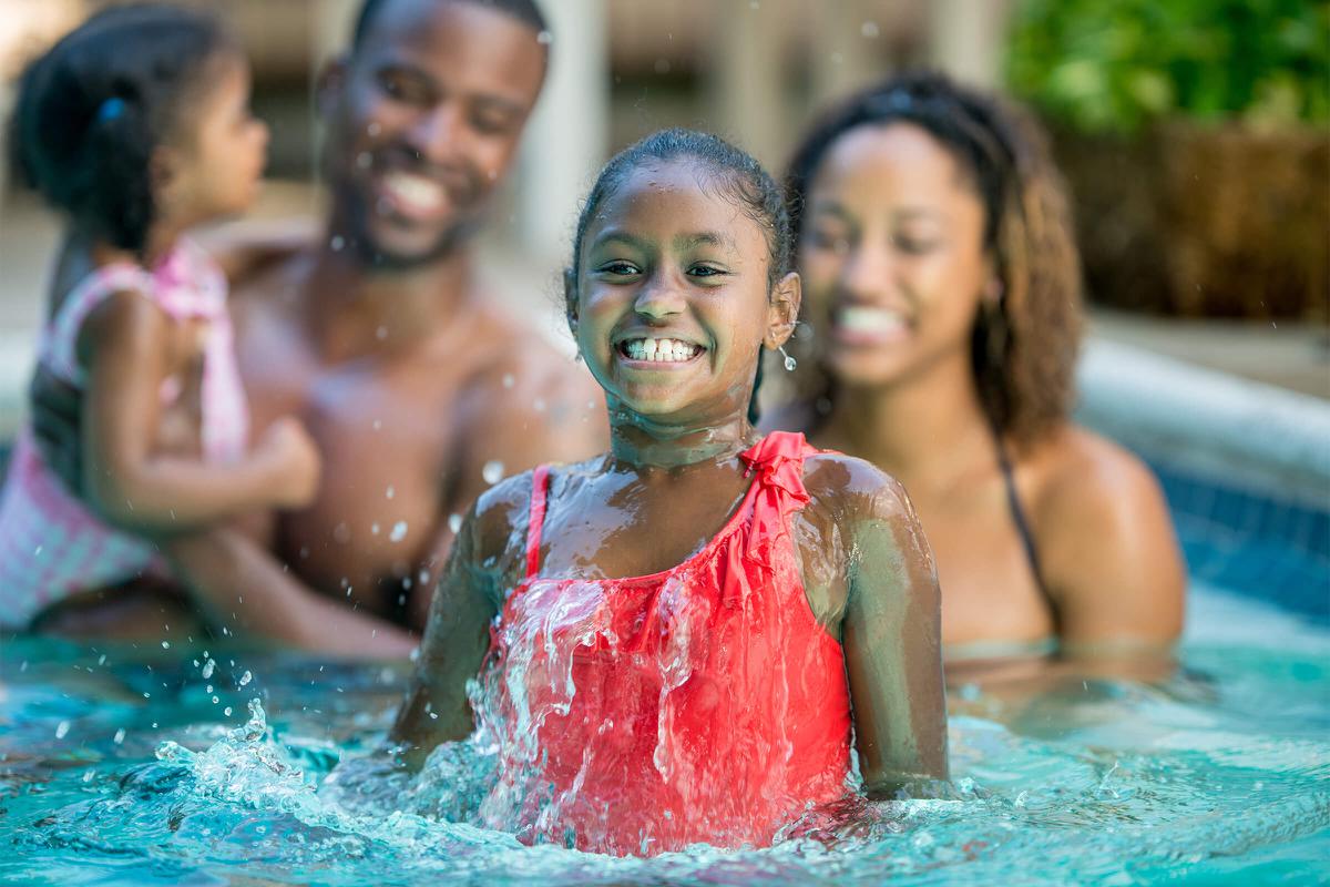 Family in pool-iStock-463243439.jpg