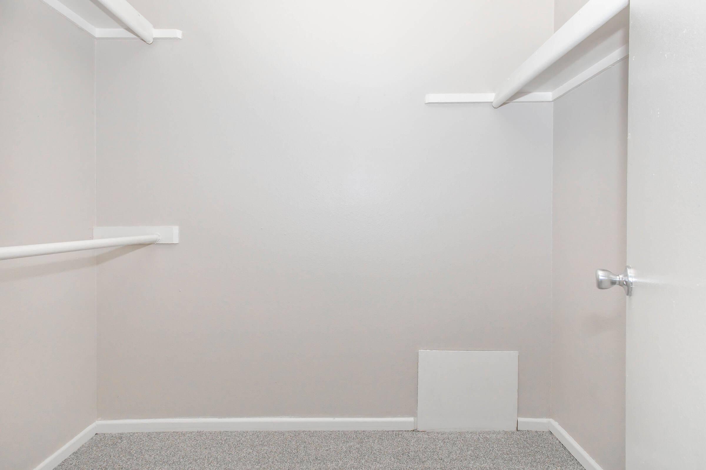 a view of a shower in a small room