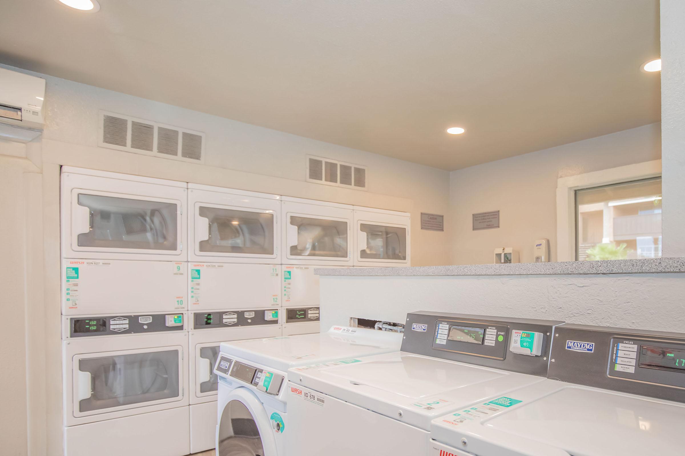 a kitchen with a sink and a microwave