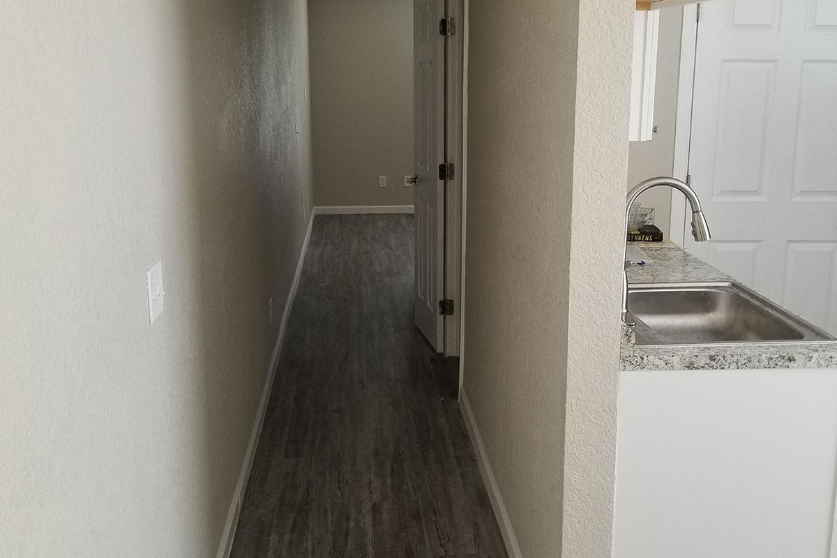 a white refrigerator freezer sitting inside of a kitchen