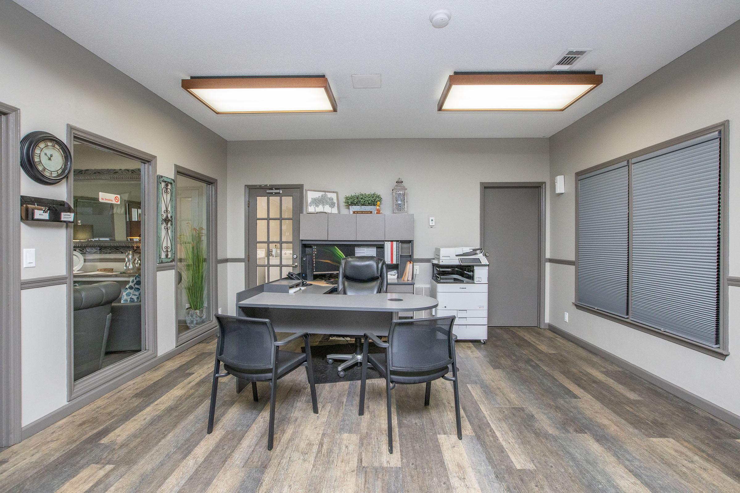 a room filled with furniture next to a building