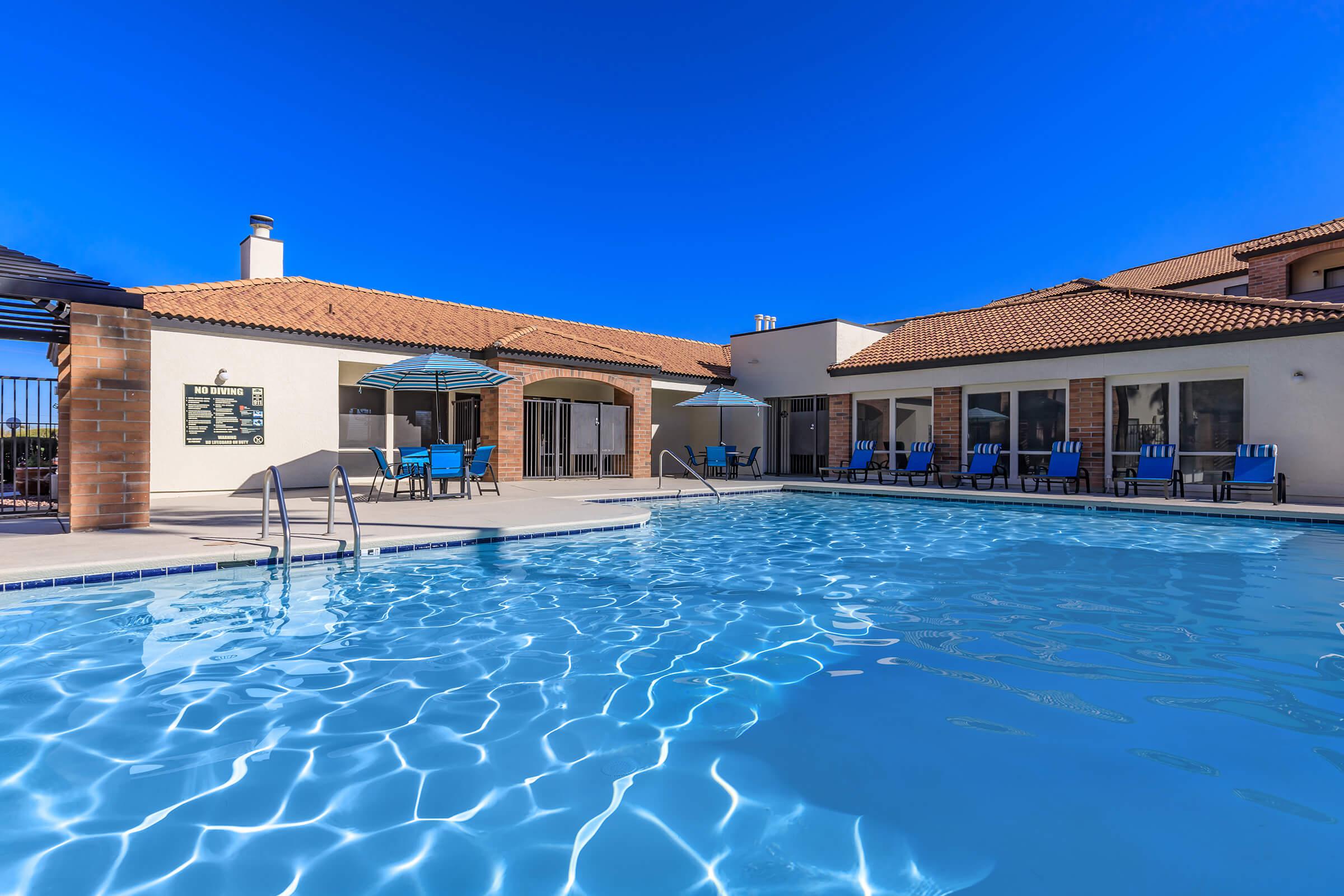 a house with a large pool of water