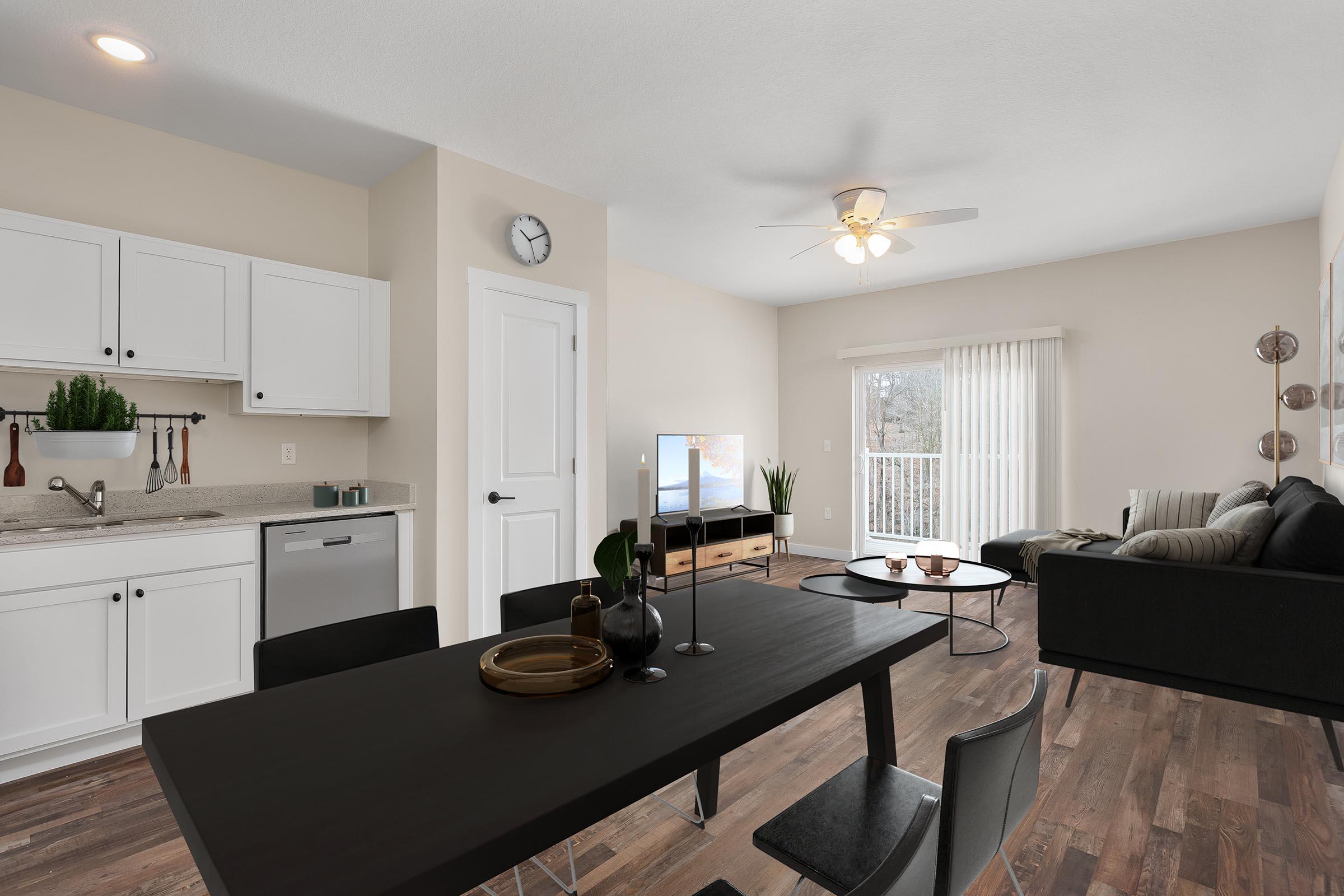 a kitchen with a table in a room