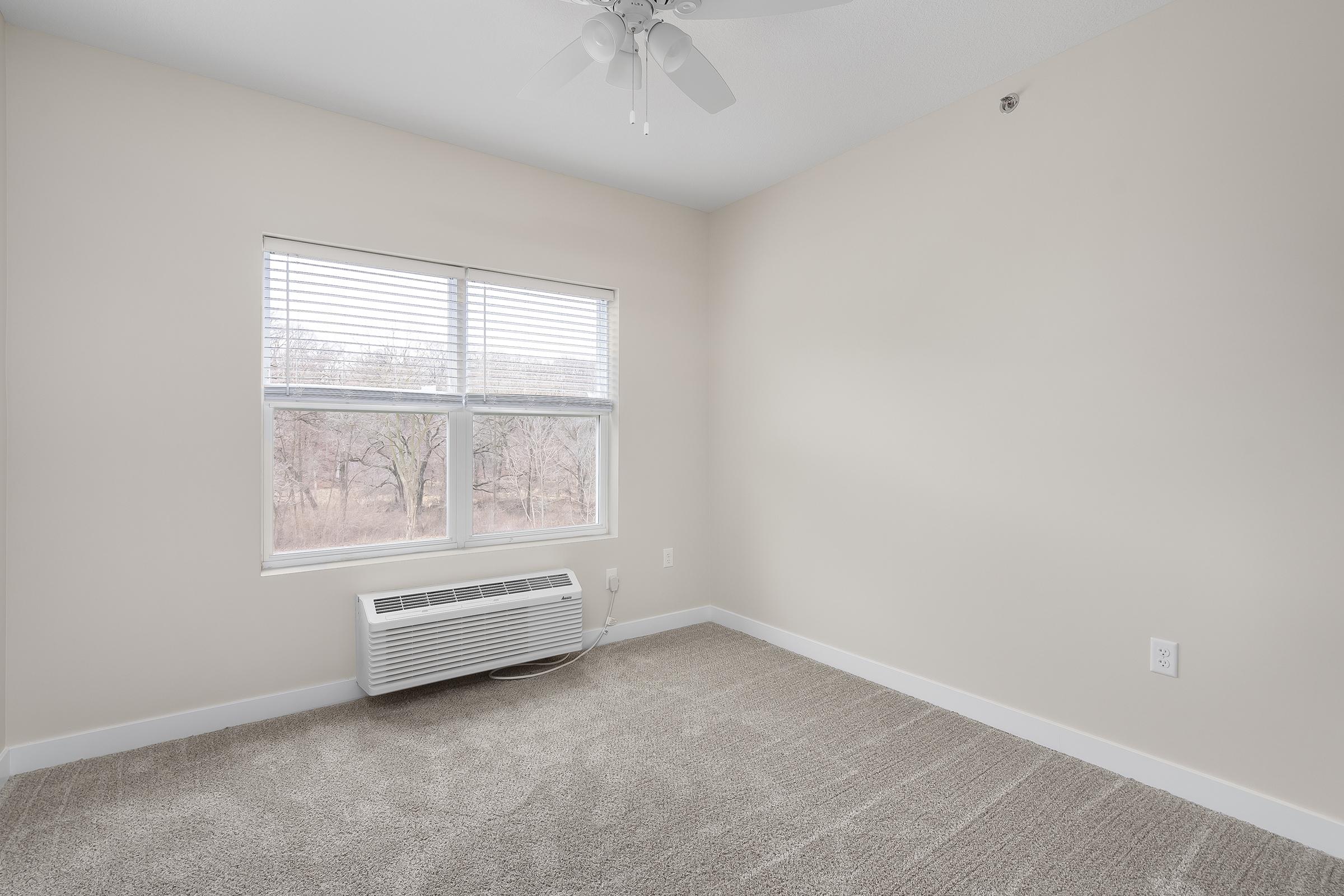 a room with a sink and a window