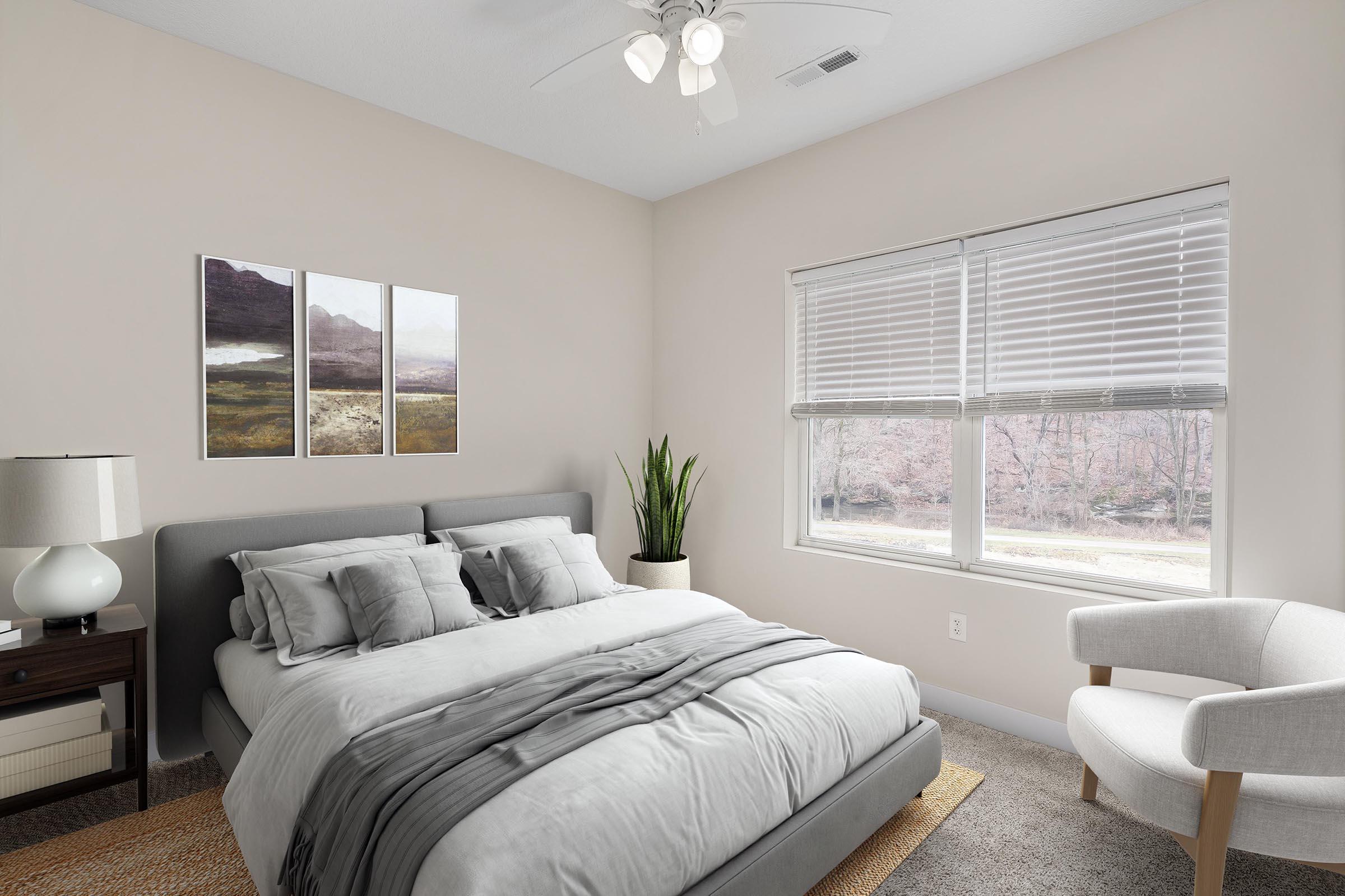 a bedroom with a large bed in a hotel room