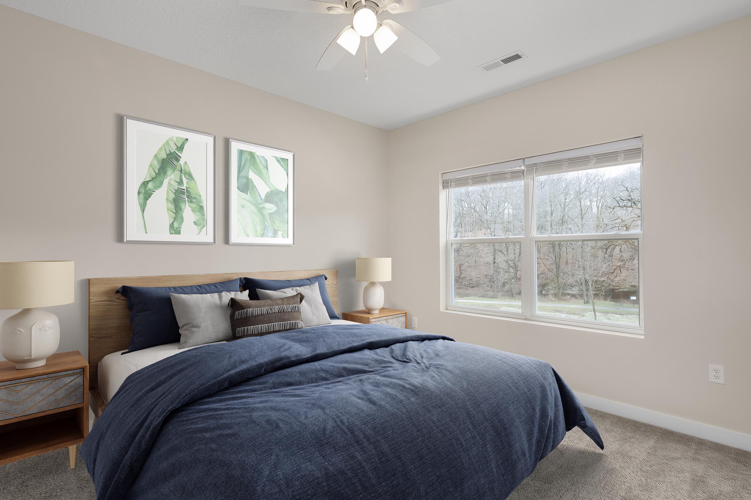 a bedroom with a large bed in a room