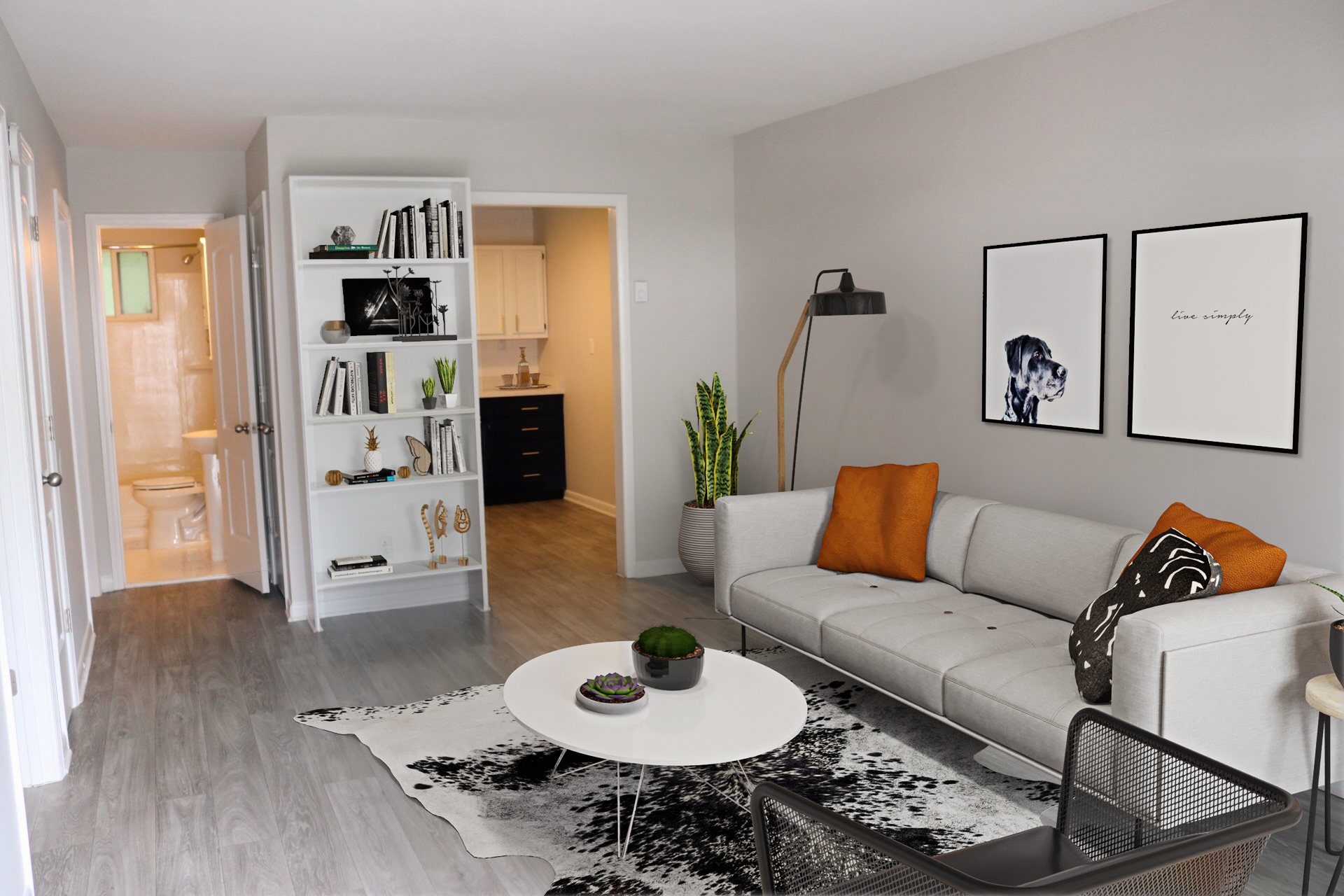 a living room filled with furniture and a flat screen tv