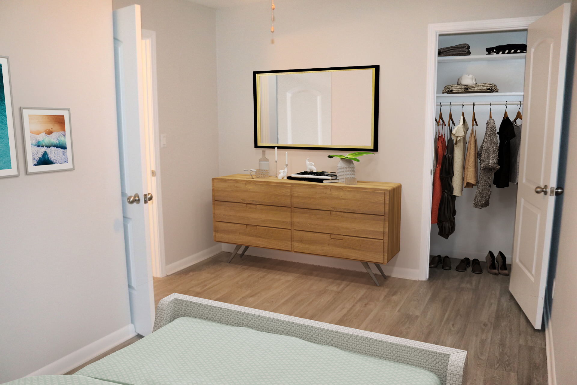 a bedroom with a bed and a mirror
