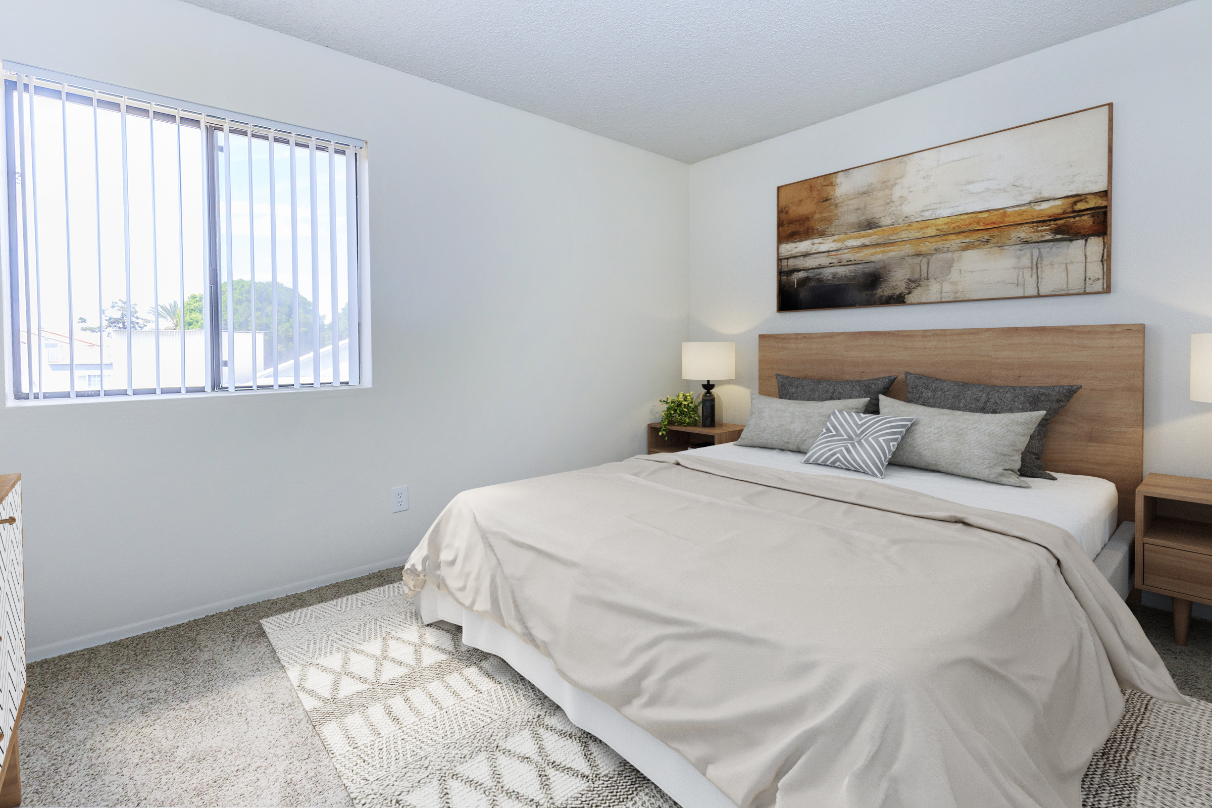 A cozy bedroom featuring a queen-sized bed with light beige bedding and decorative pillows. There are two bedside tables with lamps, a textured area rug, and a window with vertical blinds allowing natural light to enter. A piece of abstract art hangs above the bed, adding a modern touch to the room.