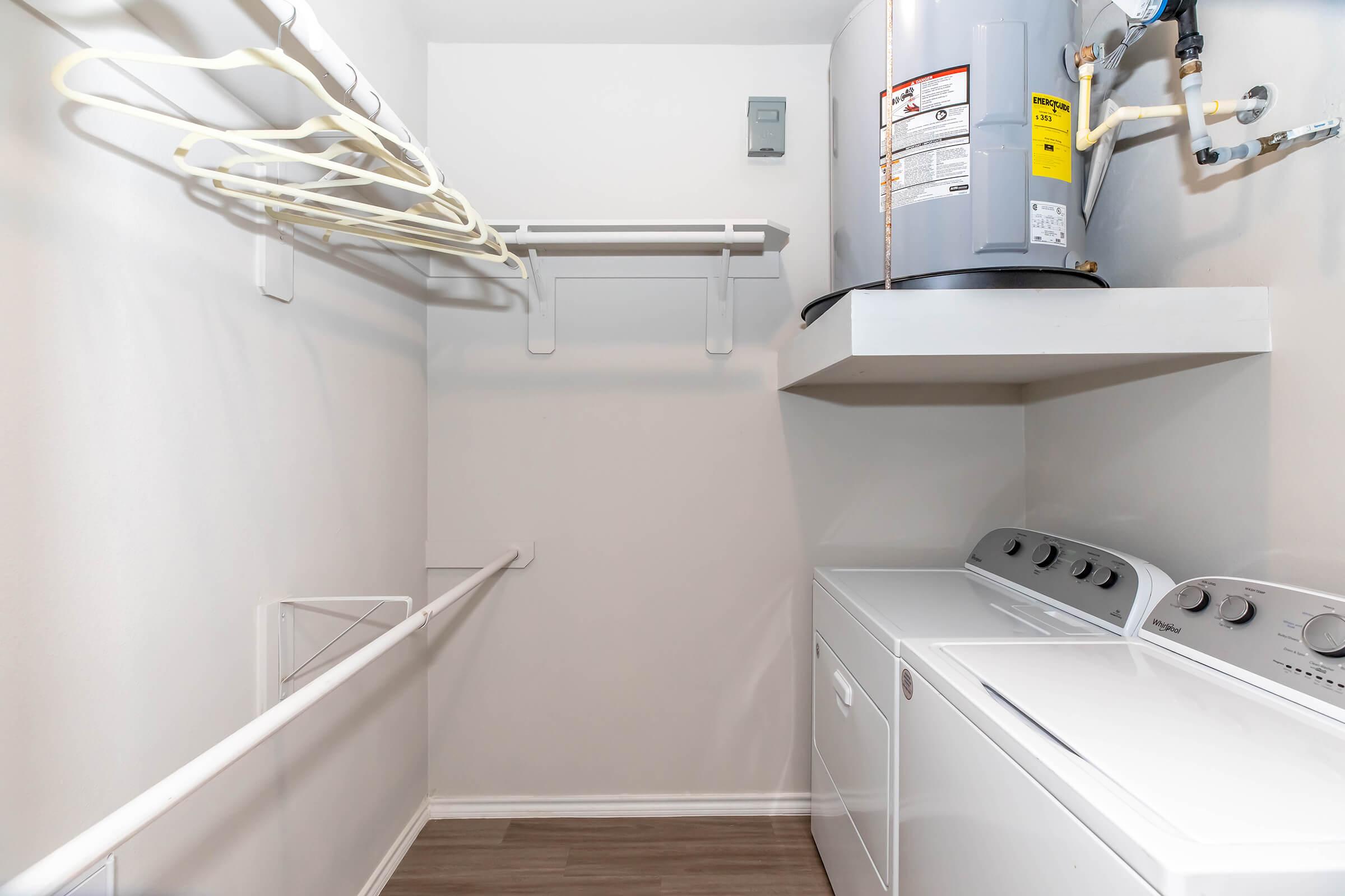 a kitchen with a sink and a mirror