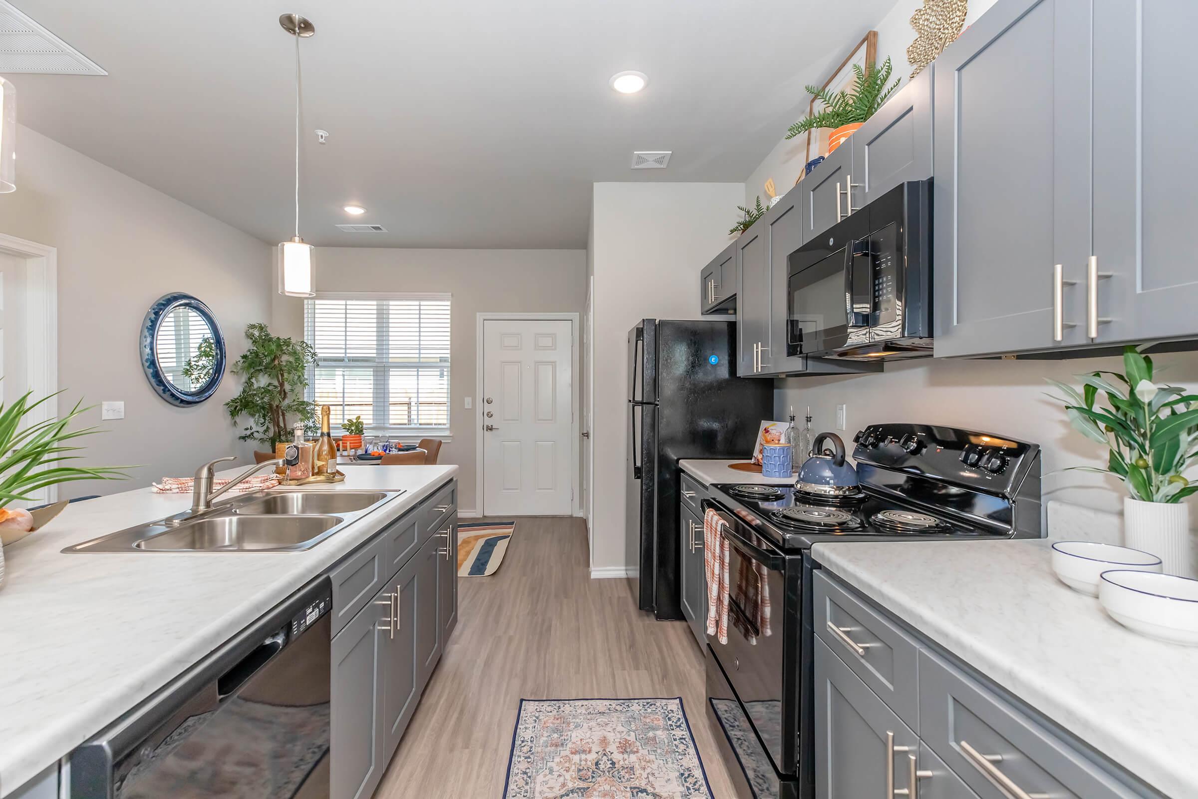 a modern kitchen with stainless steel appliances