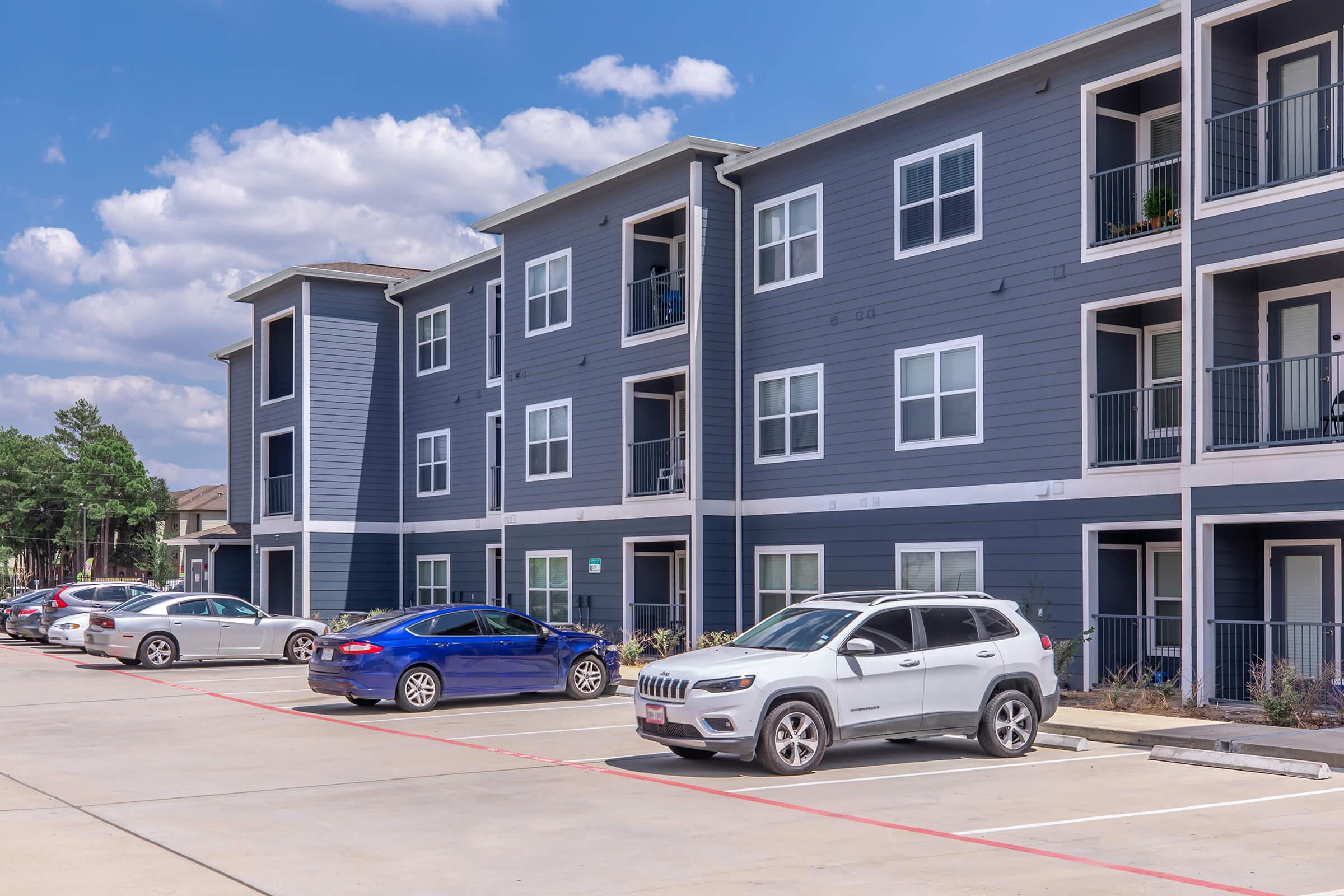 a car parked in front of a building