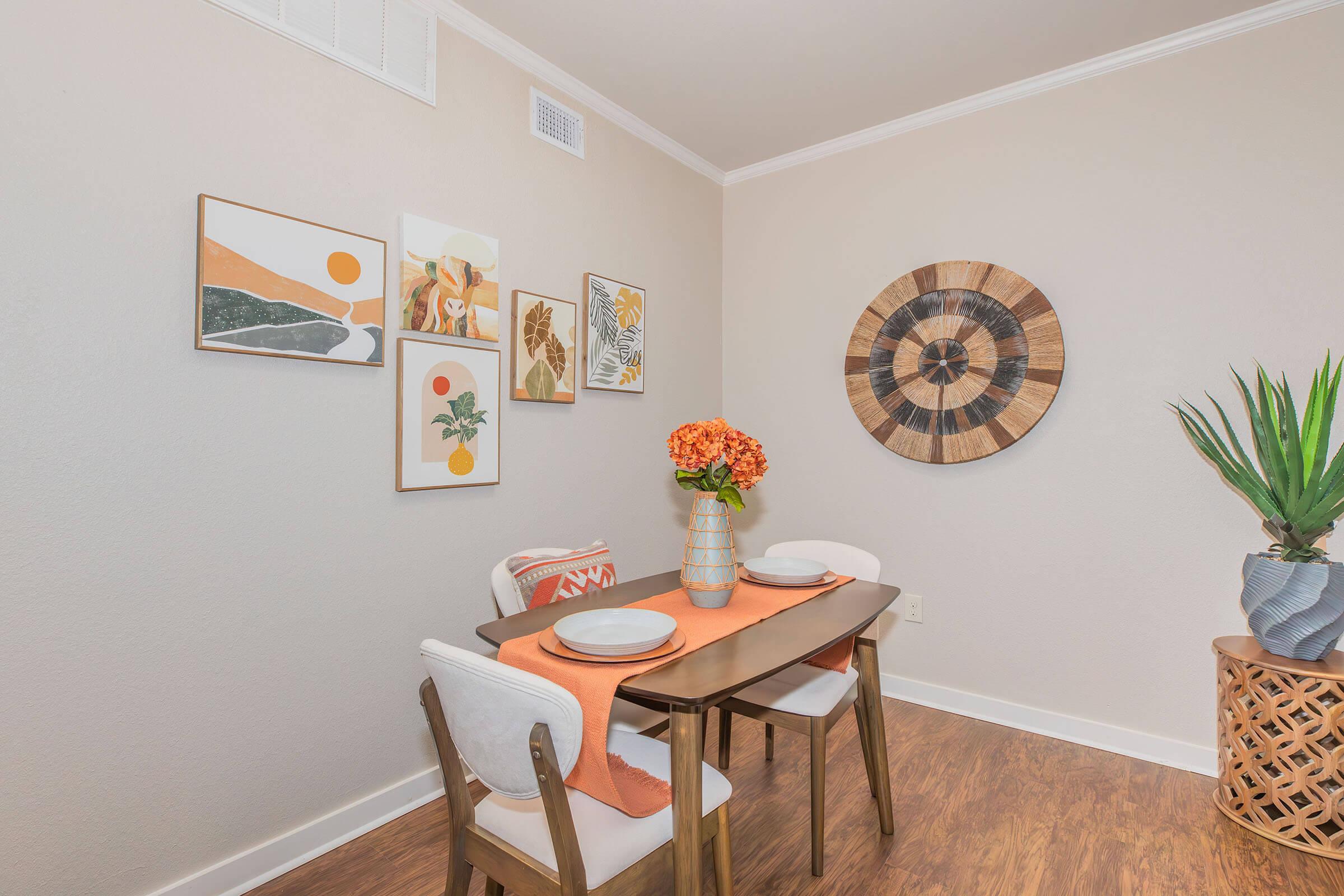 a room filled with furniture and a table