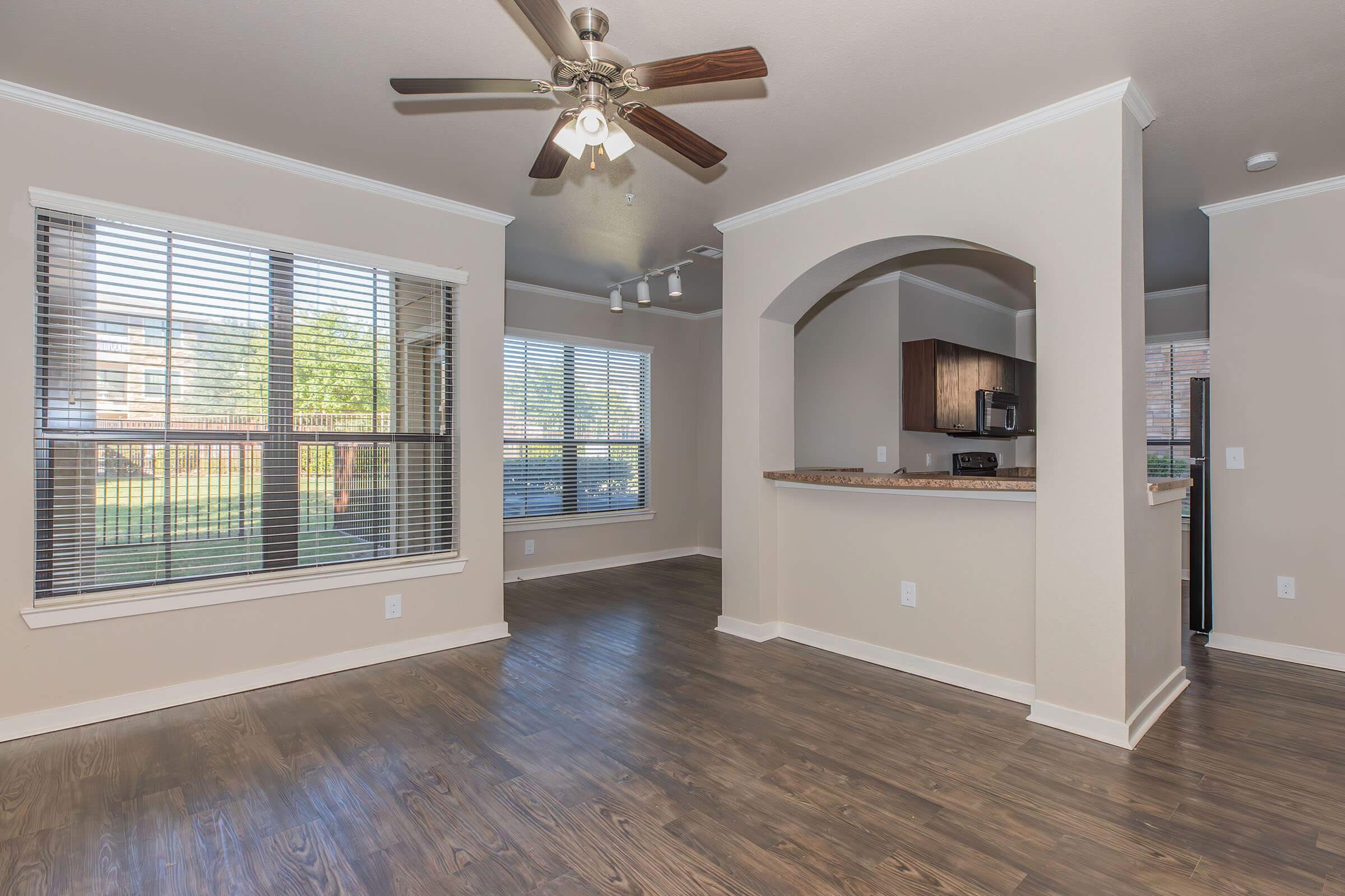 a view of a living room with a large window