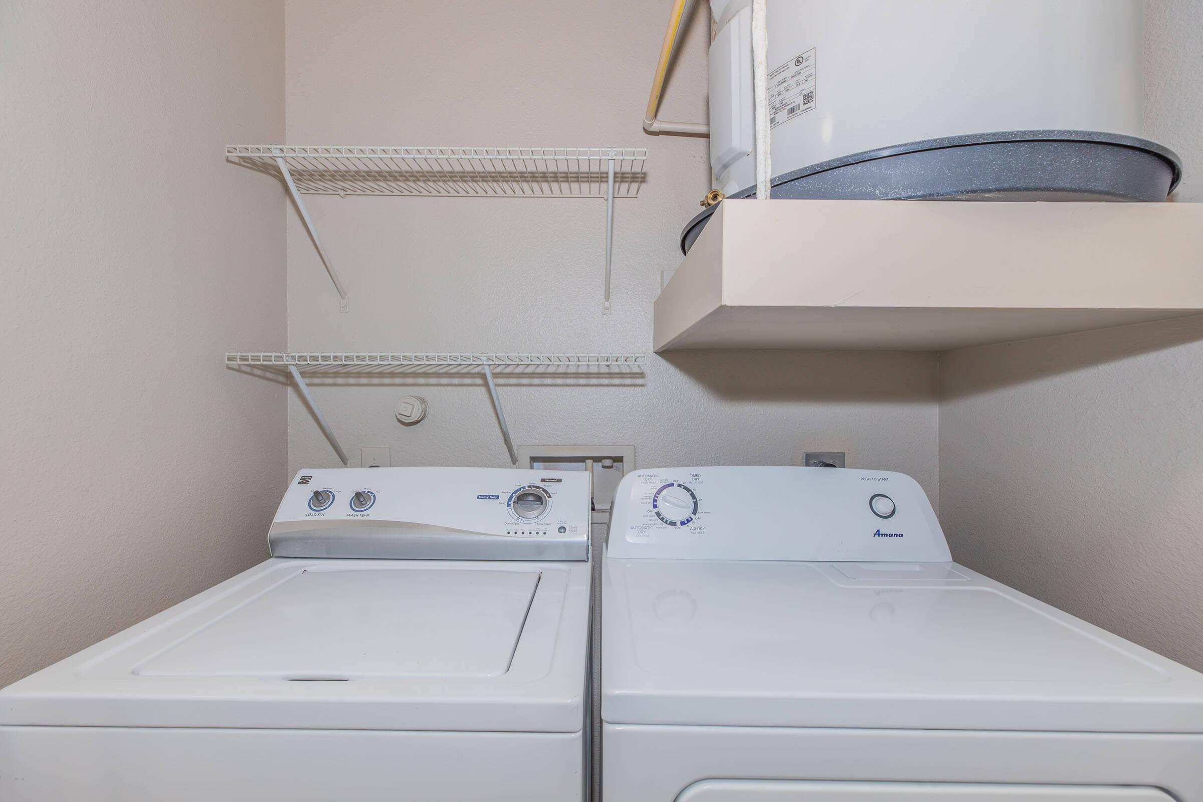 a microwave oven sitting on top of a stove