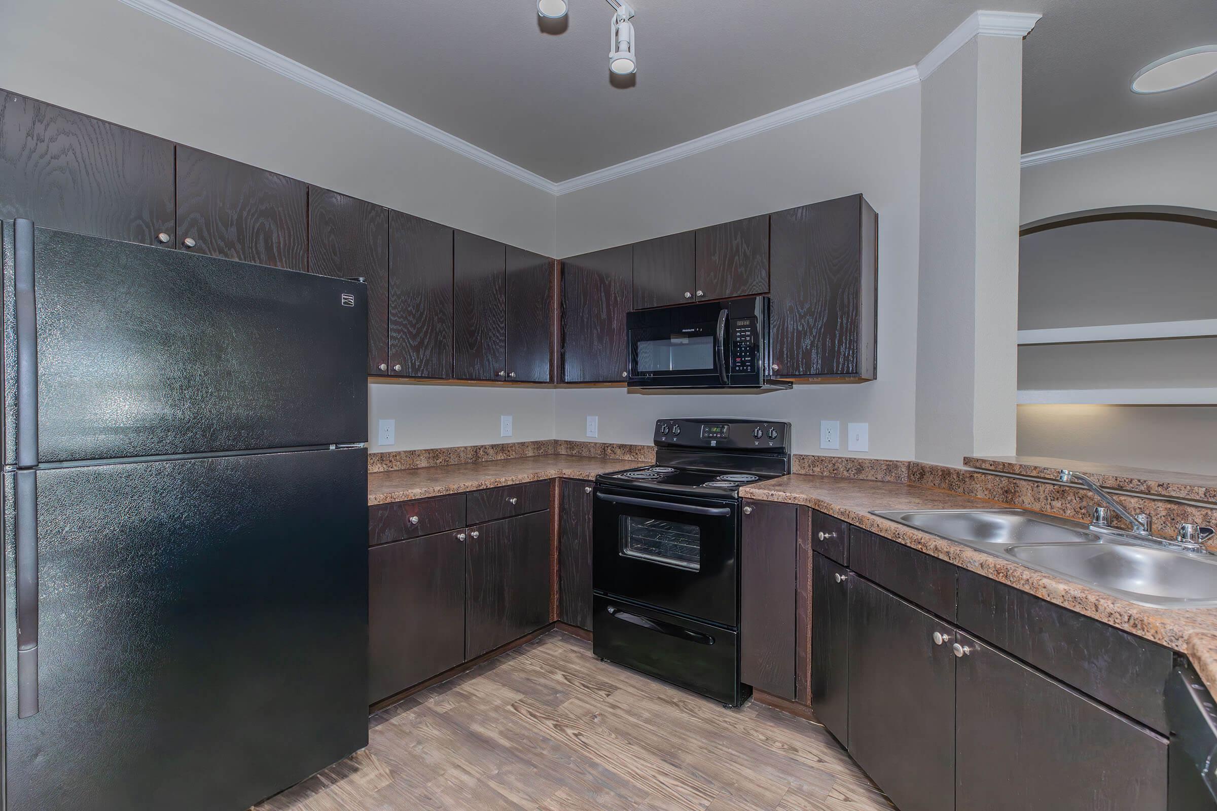 a kitchen with stainless steel appliances