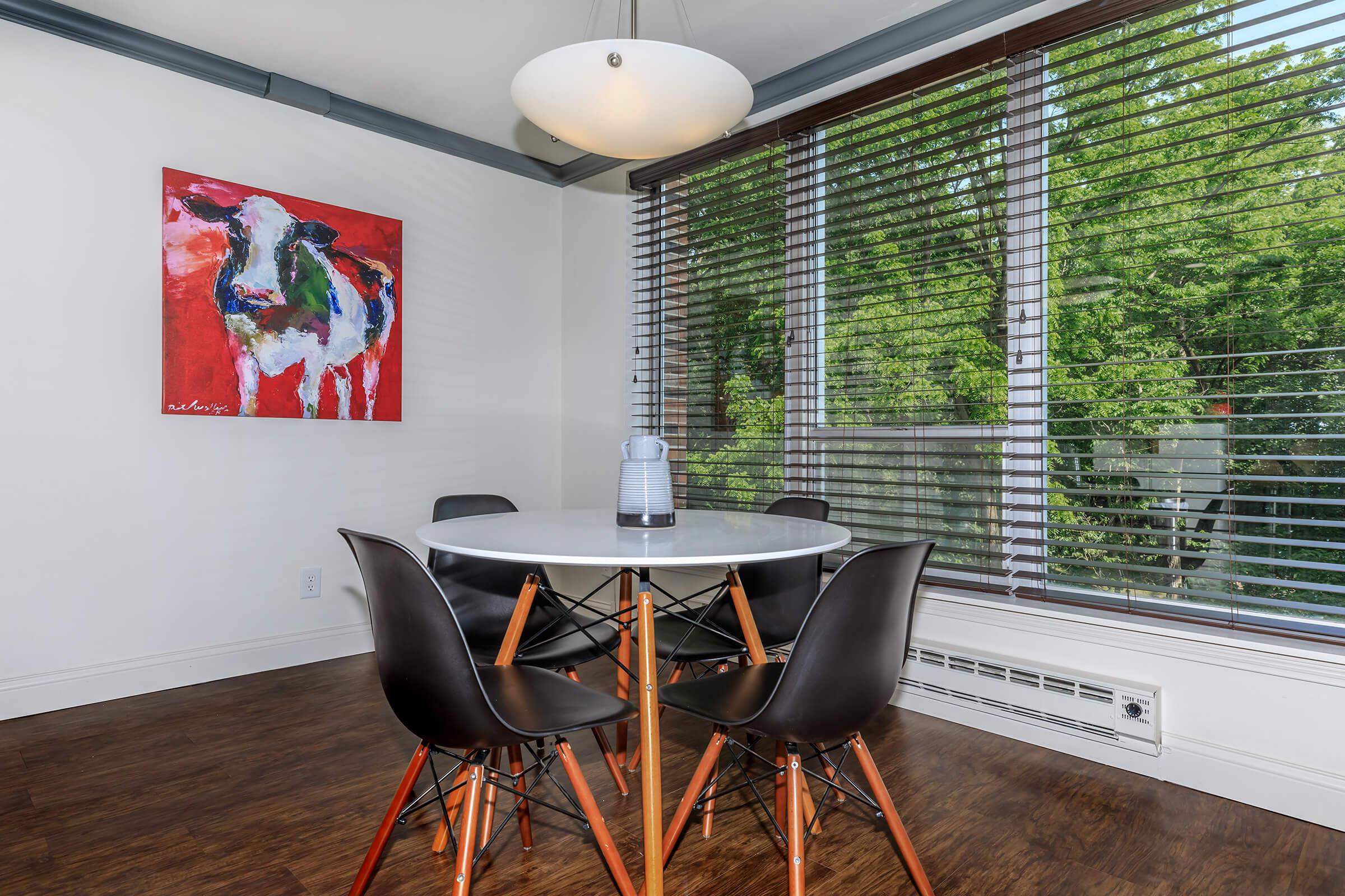 a chair sitting in front of a table