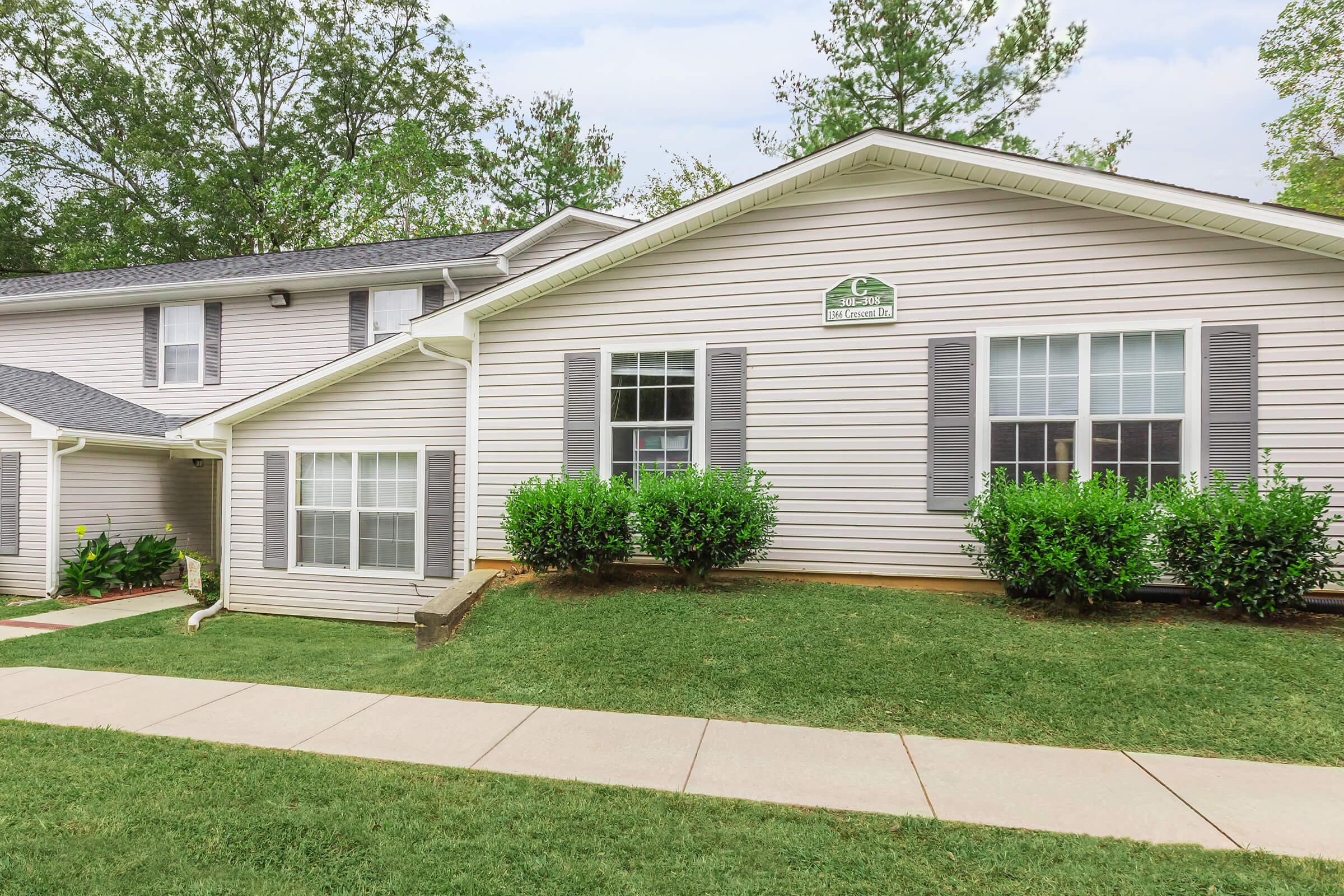 a large lawn in front of a house