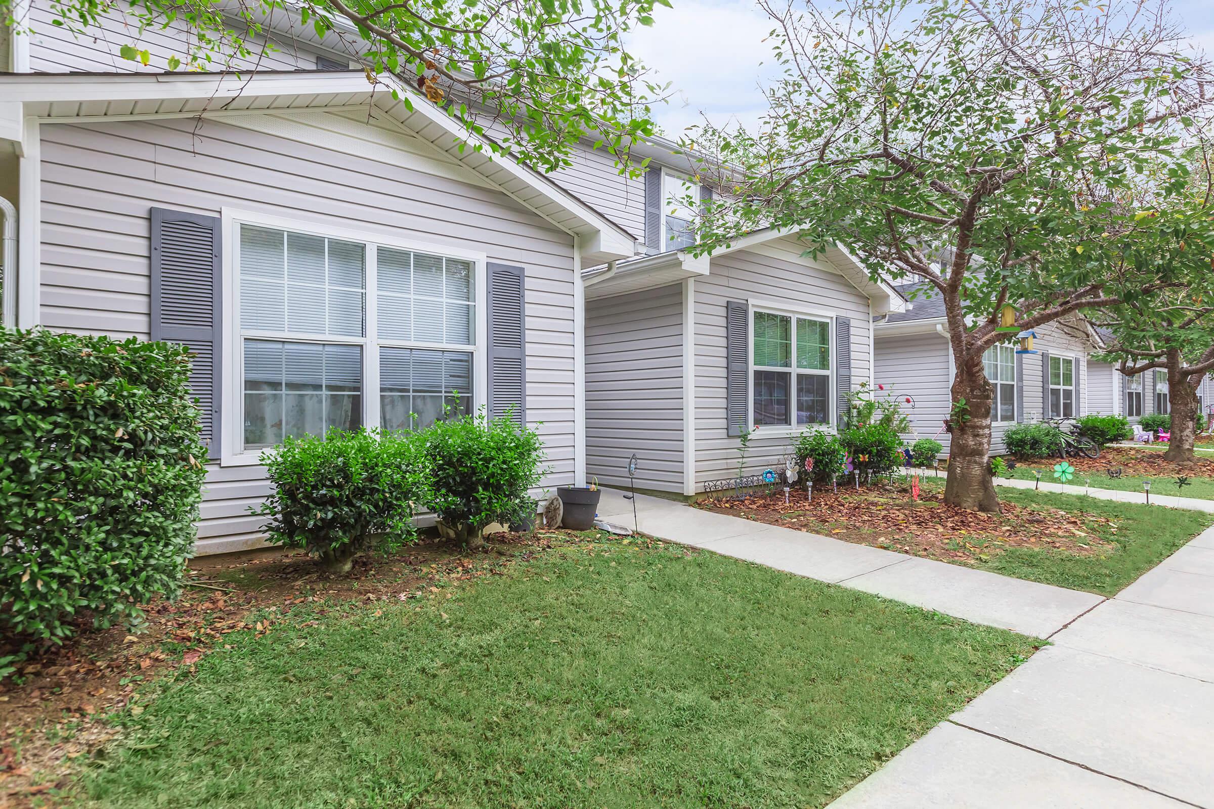 a large lawn in front of a house