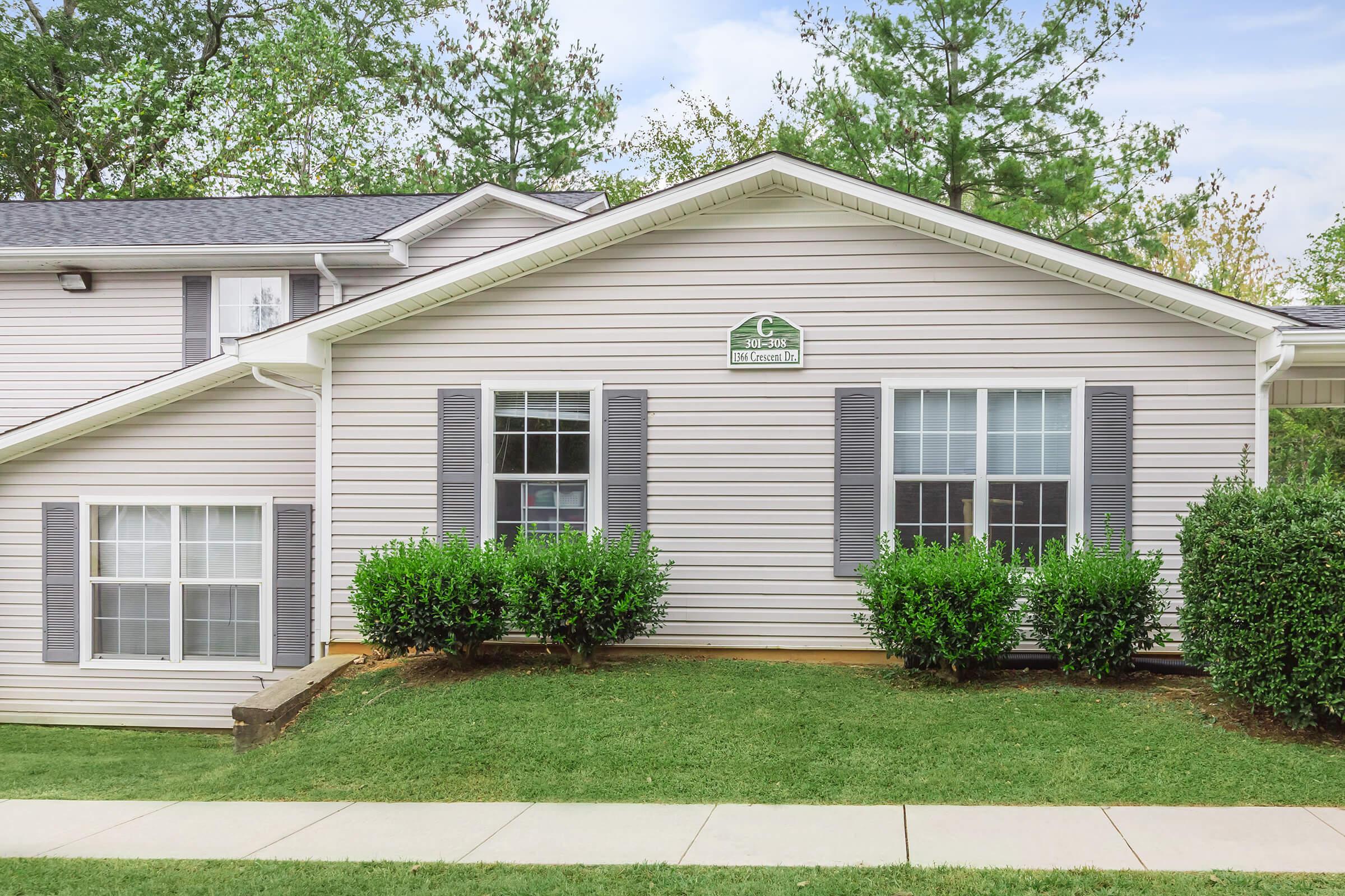 a large lawn in front of a house