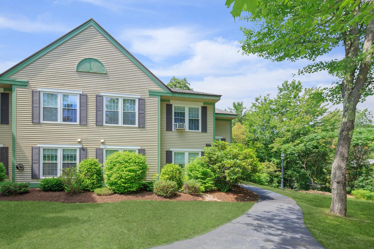 a large lawn in front of a house