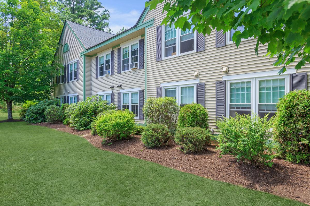 a large lawn in front of a house