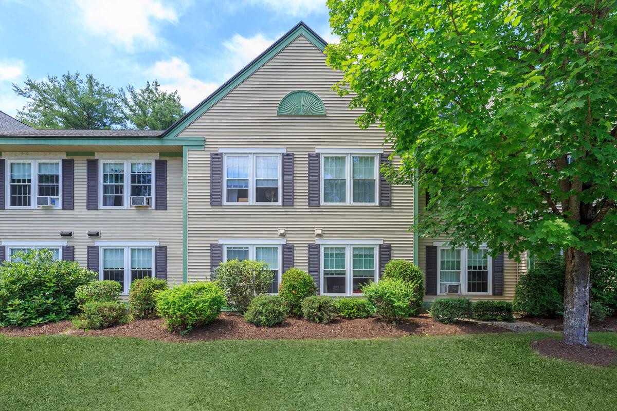 a large lawn in front of a house