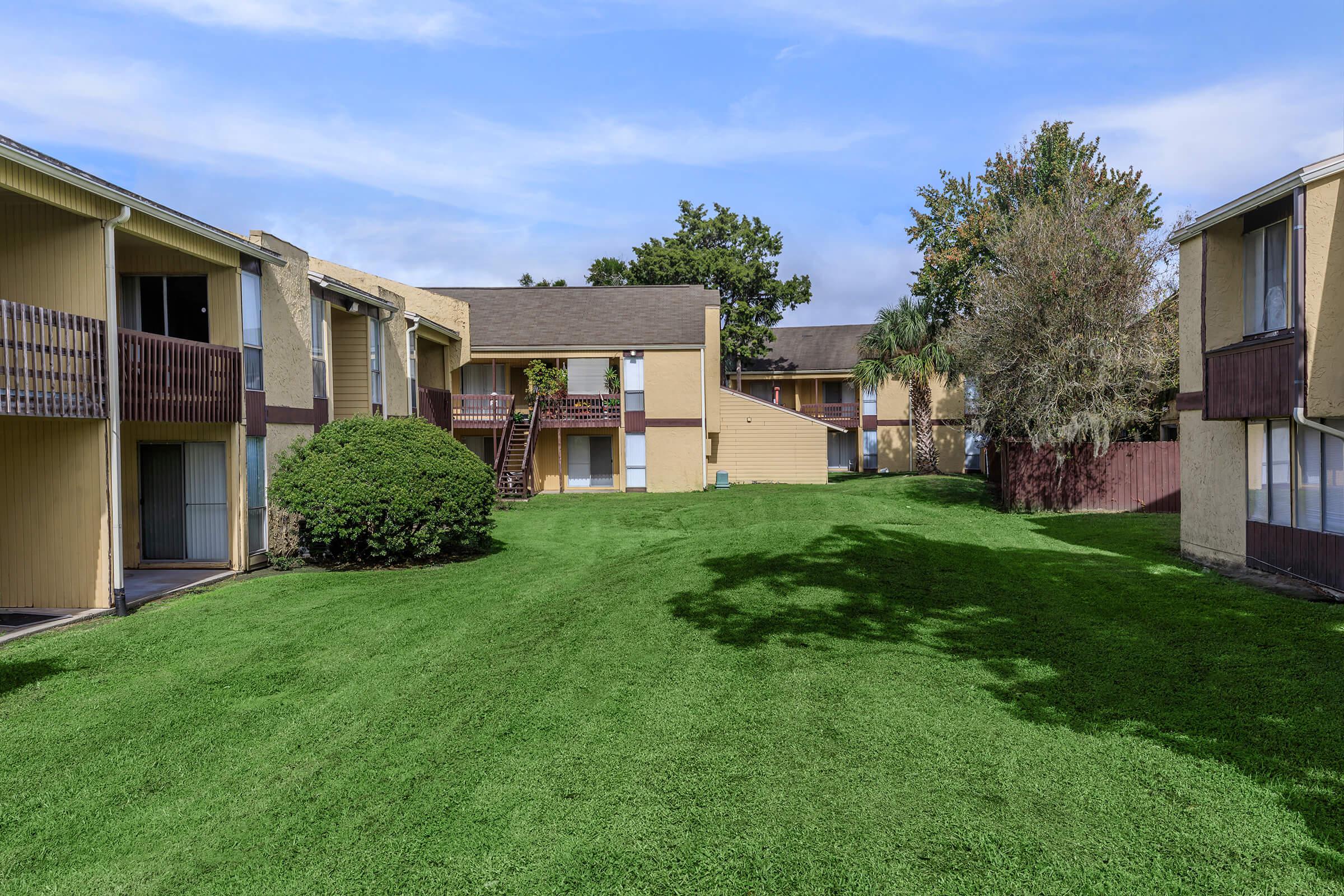 a large lawn in front of a house