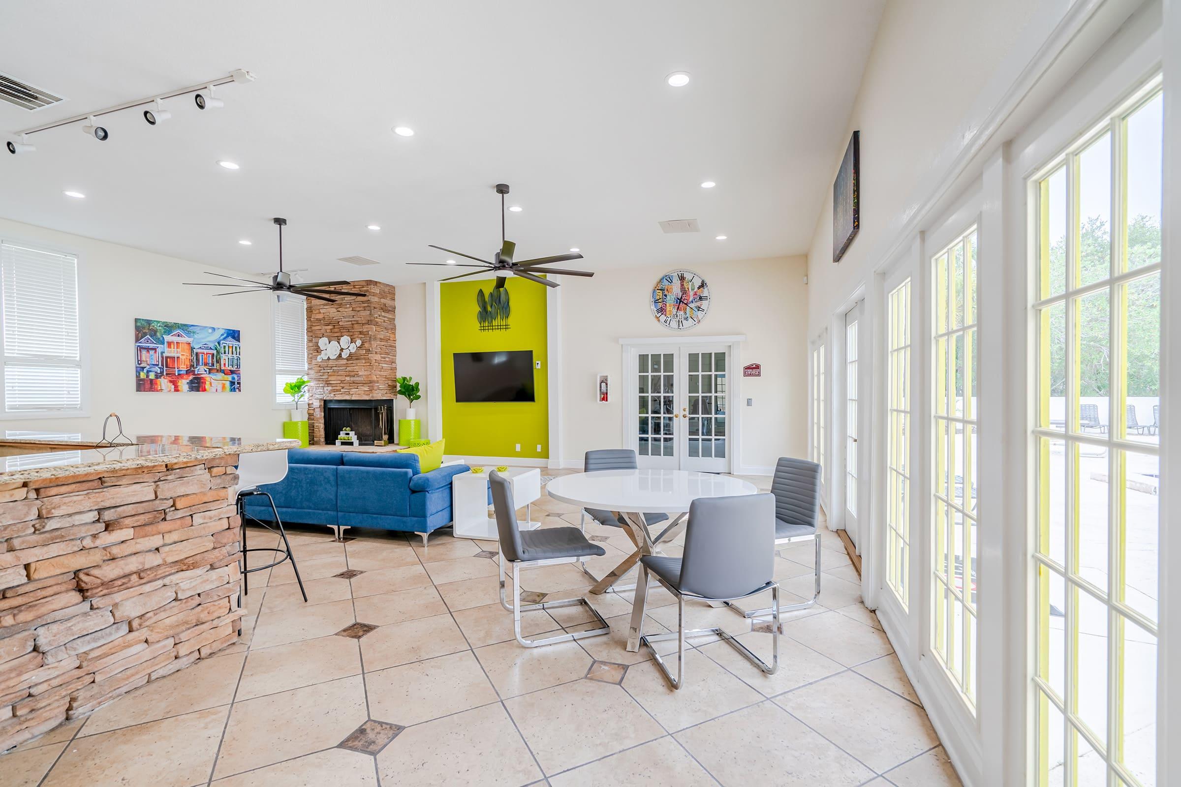 a room filled with furniture and a large window