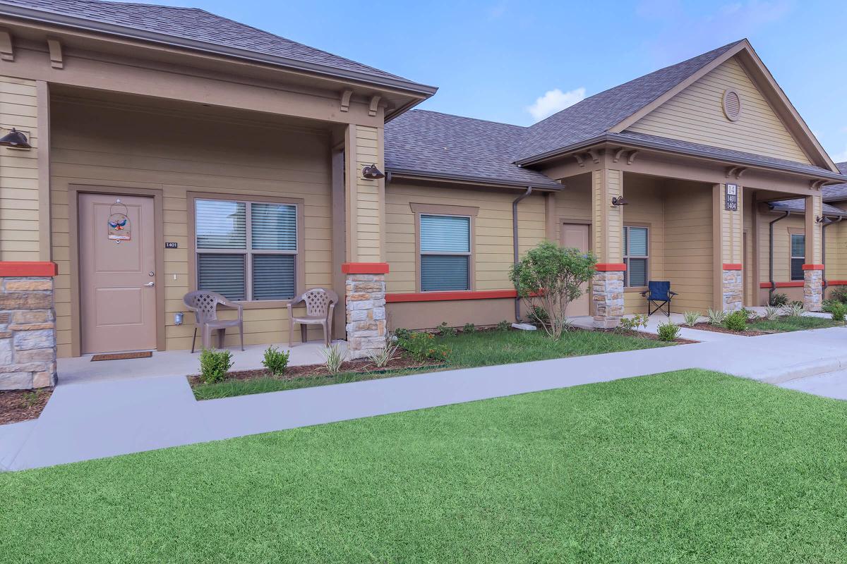 a large lawn in front of a house